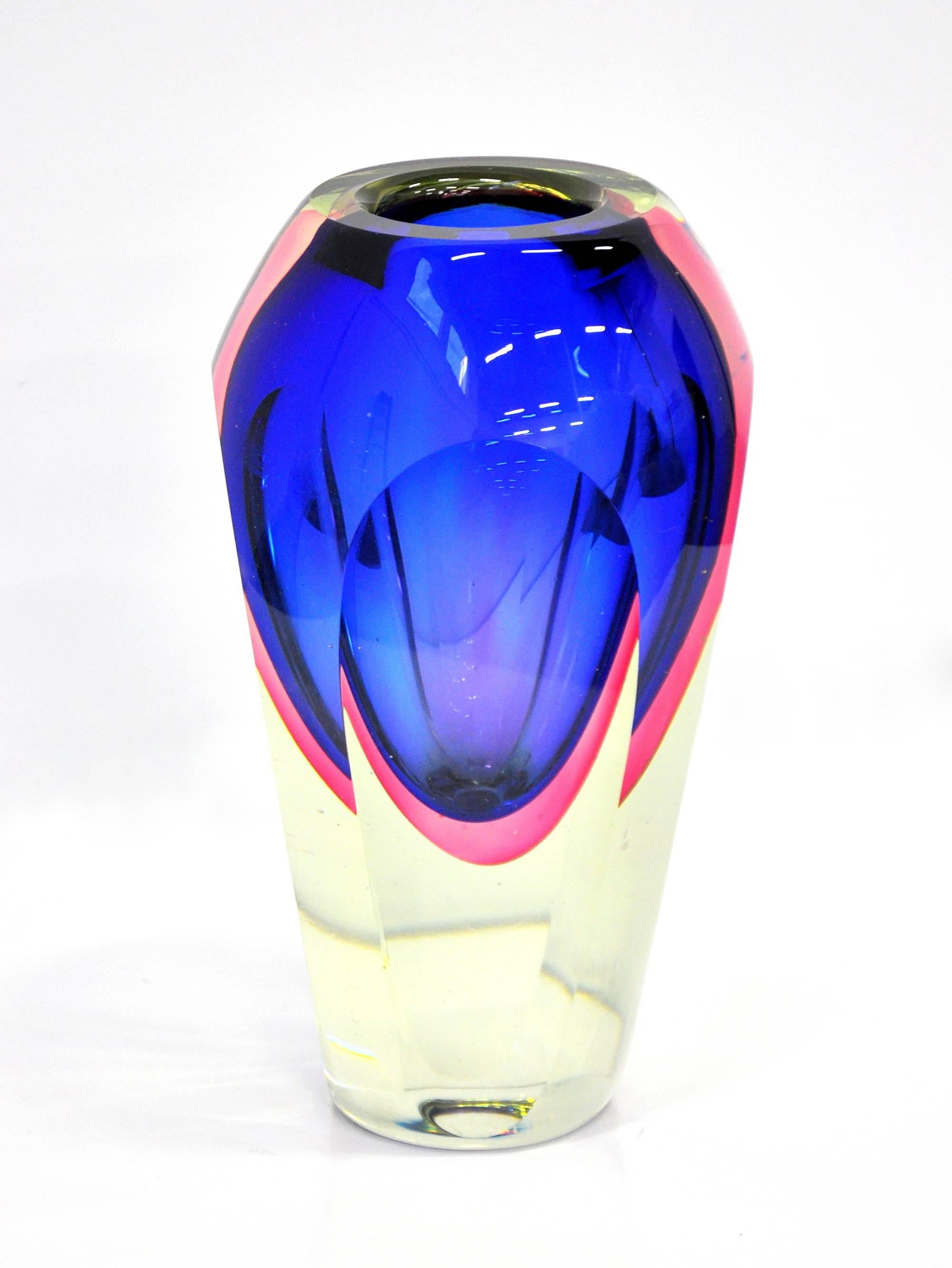 Stunning Venetian glass Sommerso vase designed by Flavio Poli for Seguso Vetri d'Arte, dating from the 1960s. The large faceted vase displays vibrant colors ranging from cobalt blue, purple and pink to clear. A fabulous example of Italian