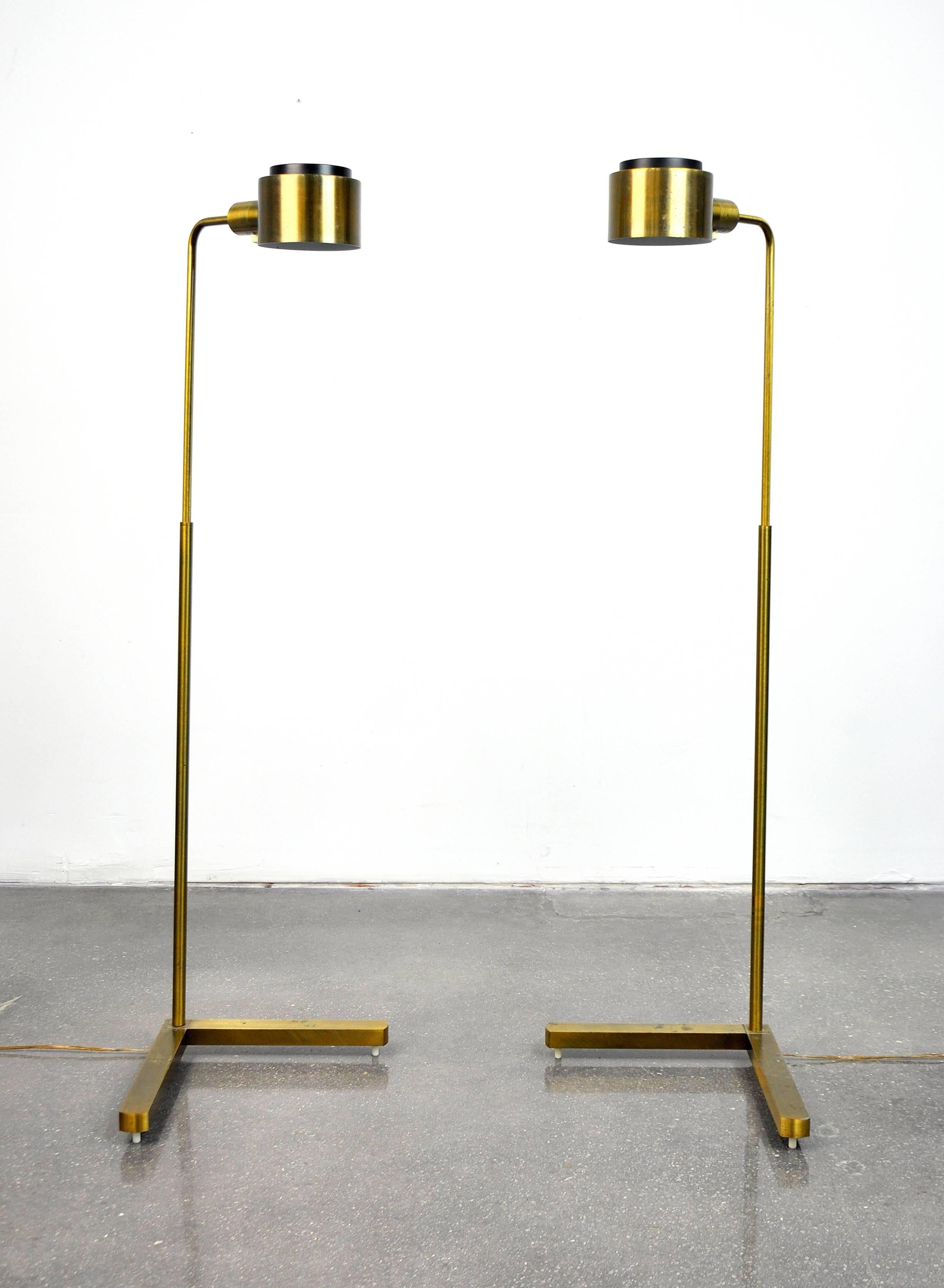 A great pair of vintage Mid-Century Modern C1139G Pharmacy corner task lamps with antique brass finish, G-shades and V-bases in the Cedric Hartman style. Each reading lamp has an adjustable height to a maximum of 49.75 inches, and a full range