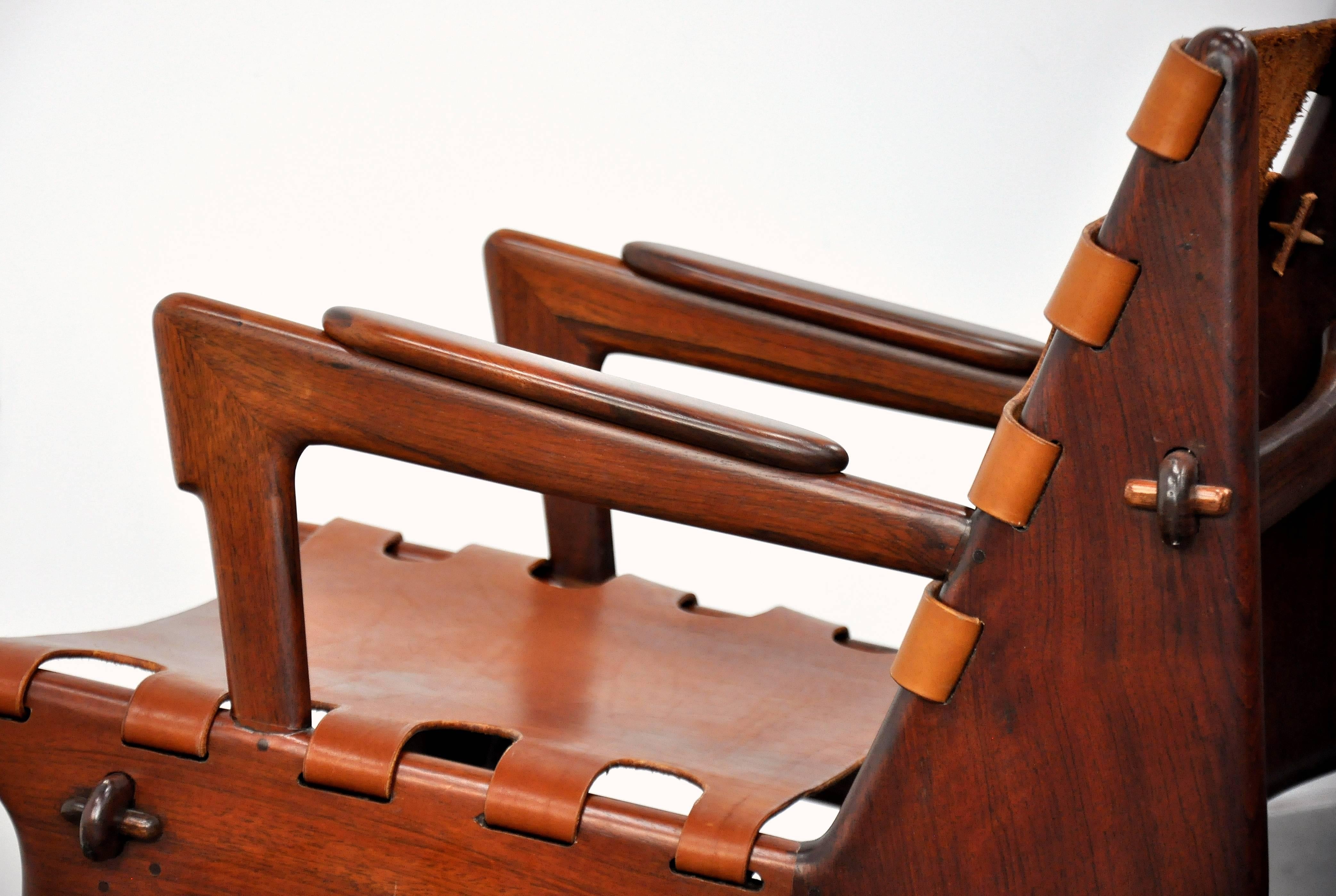 Mid-20th Century Pair of Angel Pazmino Rosewood and Leather Sling Armchairs and Ottoman