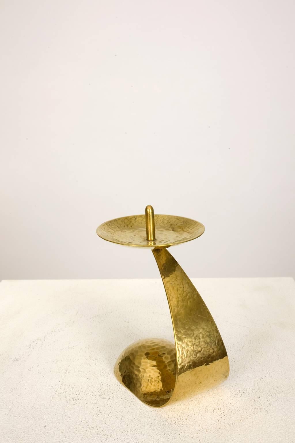 A beautiful desk set of five pieces made of hammered brass and created by Benno Meyer.

Can:
Height: 3.54 inch, diameter 2.44 inch.

Candleholder (big):
Height: 3.14 inch, diameter: 1.5 inch.

Candleholder (small):
Height: 1.98 inch,