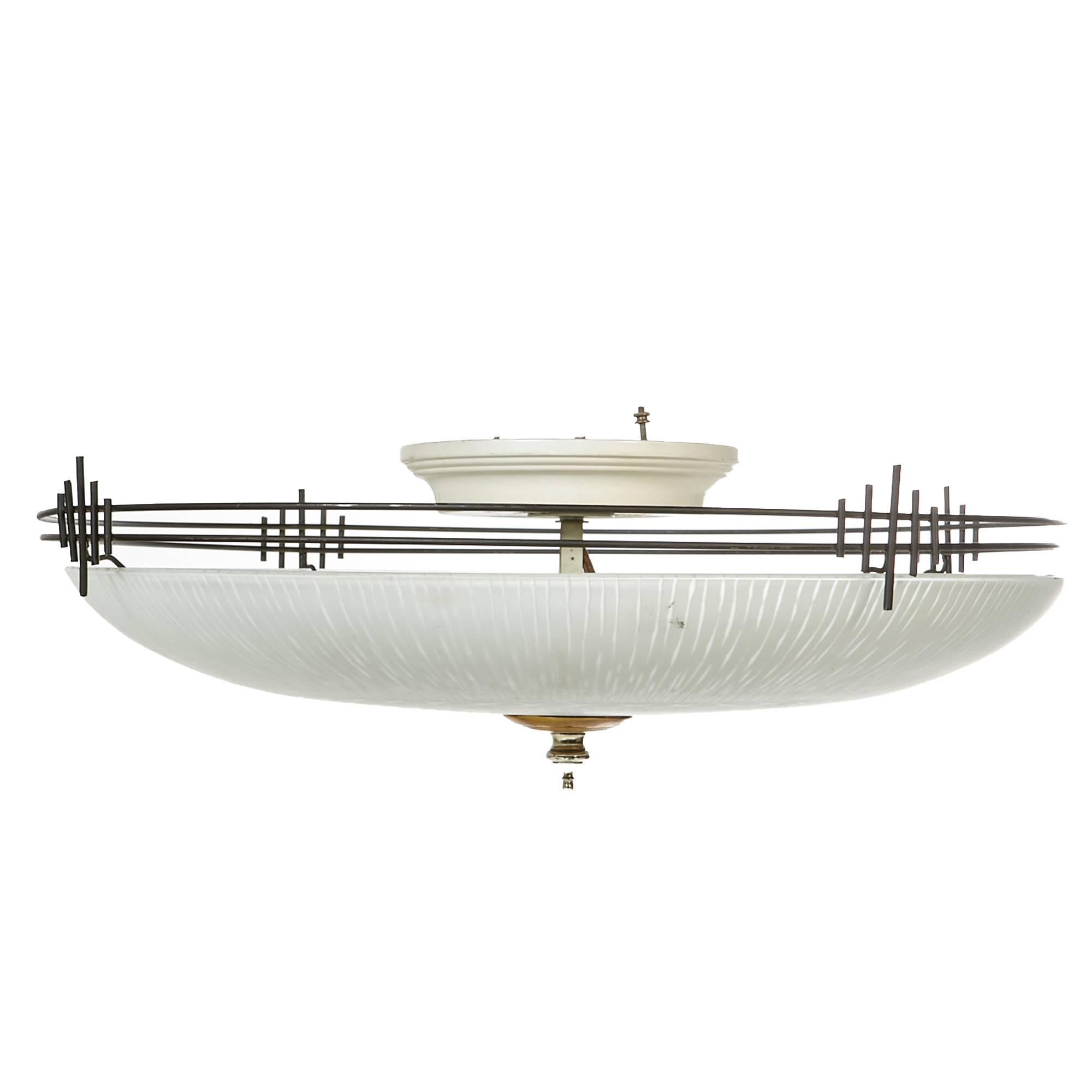 Art Deco style large black metal designed flush ceiling mount light with frosted glass shade. Hard wired for the US. Holds four standard US light bulbs, 75W max ea. Unmarked.