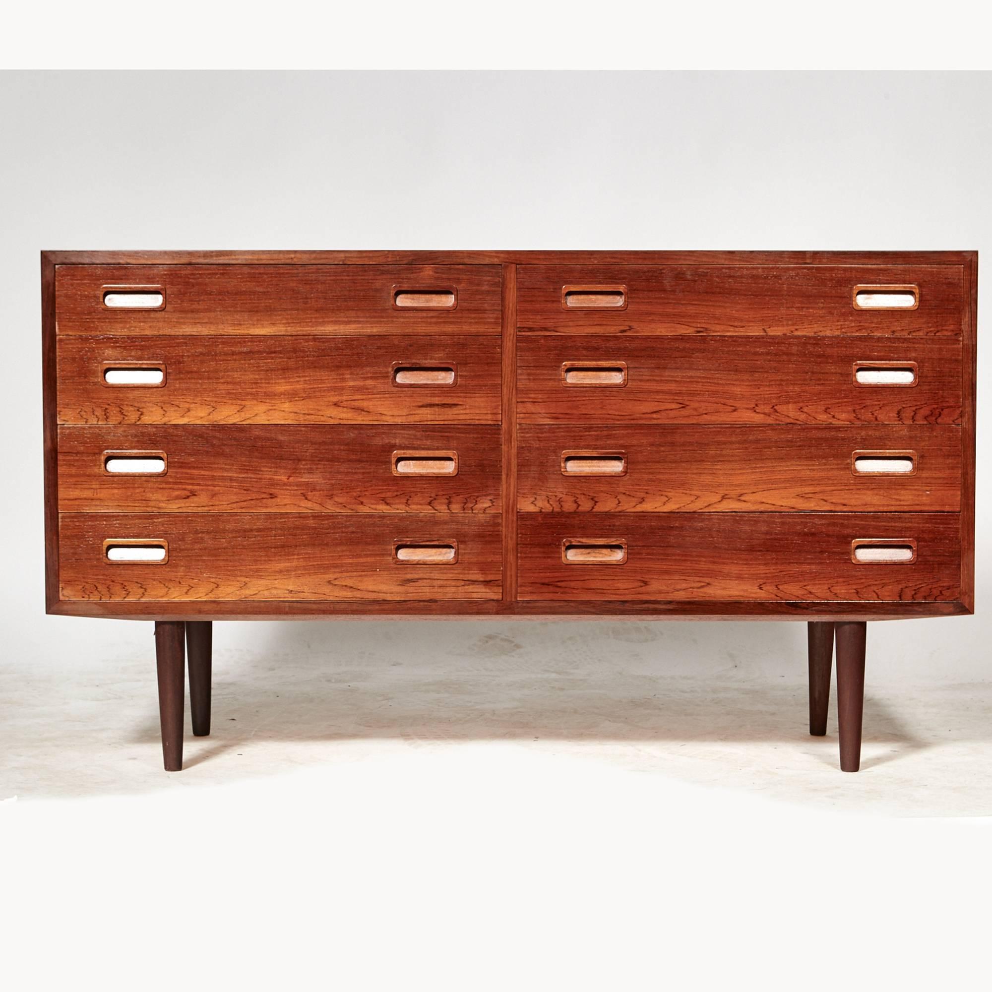 Brazilian rosewood chest of drawers designed in Denmark by Poul Hundevad, 1960s. The chest has eight drawers with inset pulls. Marked.