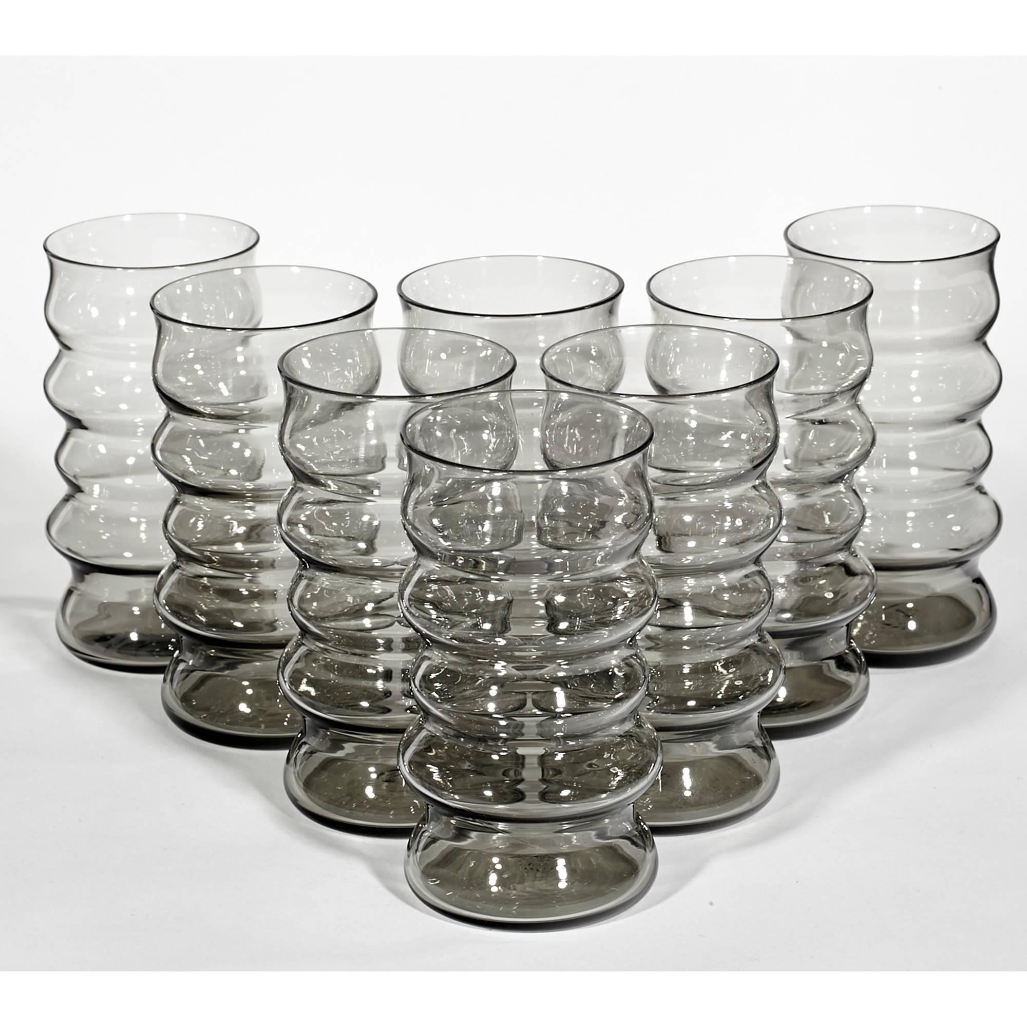 Vintage Mid-Century Modern set of eight smoked tumblers with a stacked design. Unmarked.