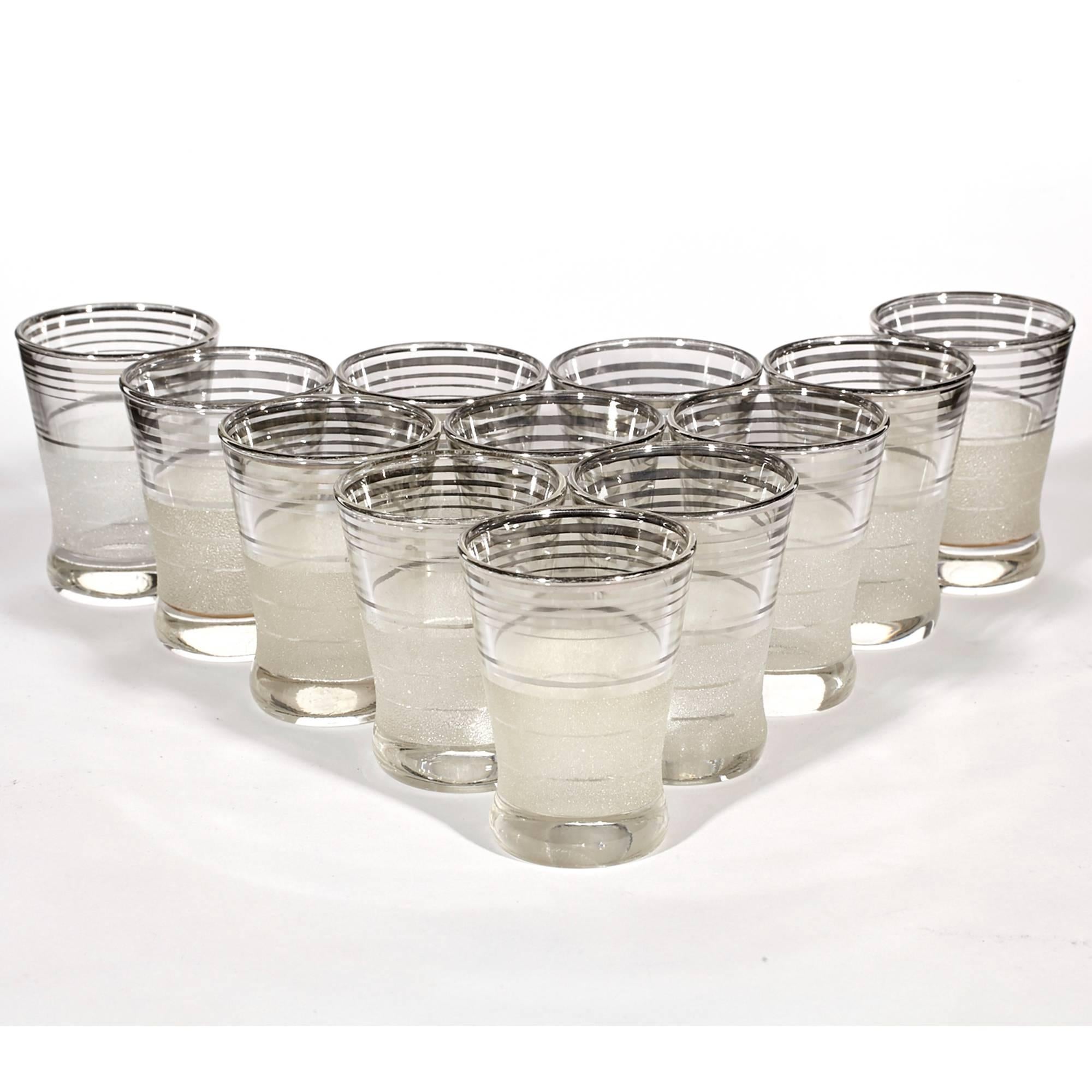 Vintage Art Deco set of 12 textured glass and multi-silver ringed liquor glasses.