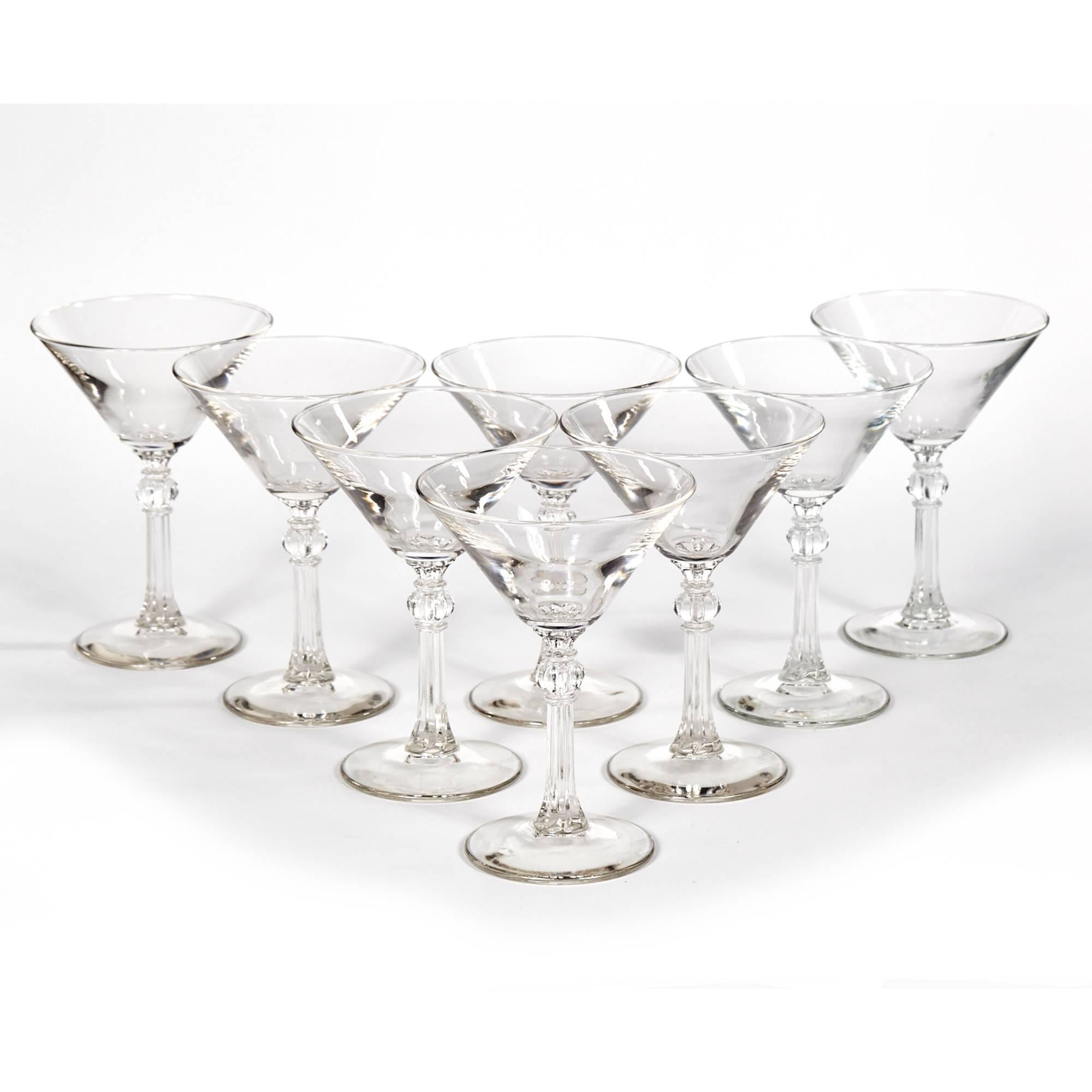 Vintage clear glass martini stems set of eight, circa 1950s.
 