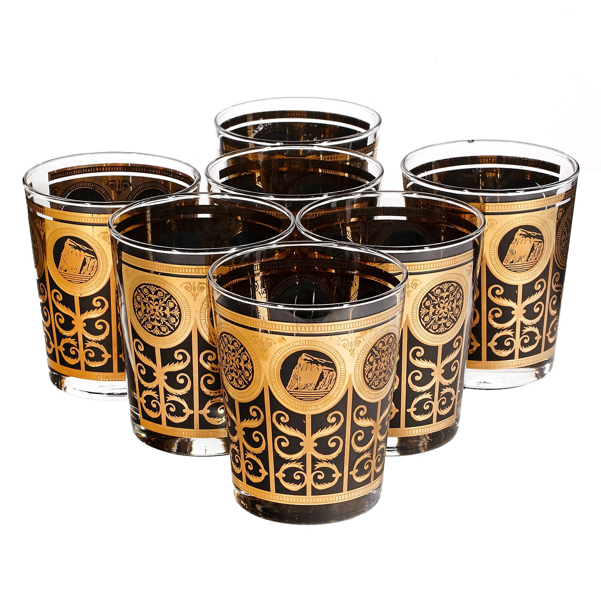 Vintage oversized gilt and black glass old fashioned bar tumblers set of seven, circa 1960s.