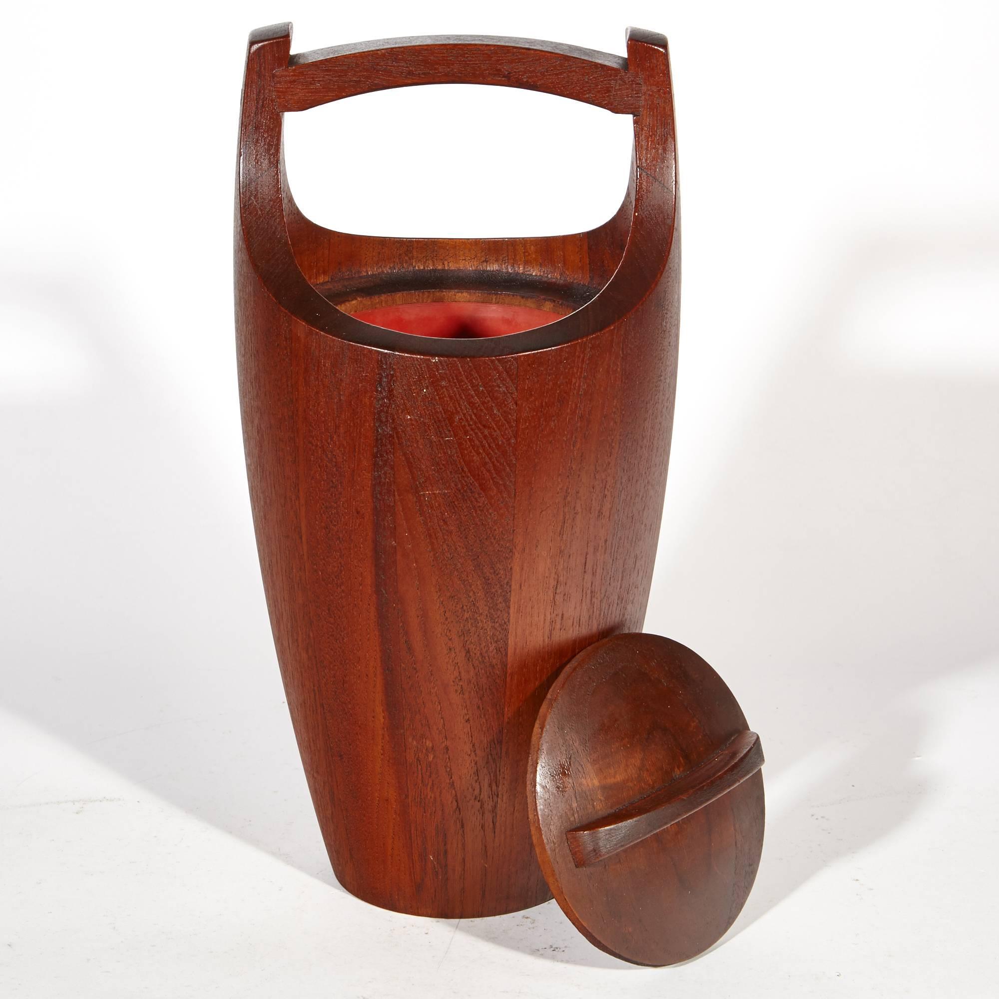 Vintage Danish staved teak wood handled ice bucket designed by Jens Quistgaard, circa 1950s. Marked underneath.