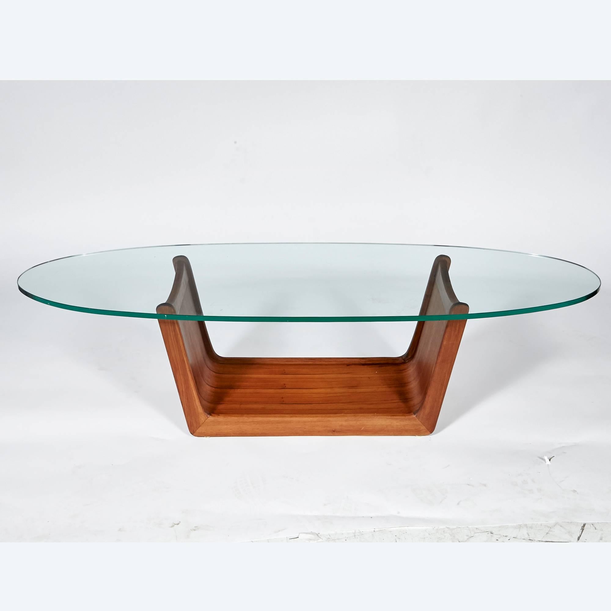 Vintage Mid-Century Modern oval glass top walnut based coffee table designed by Adrian Pearsall. Base is in refinished condition.
