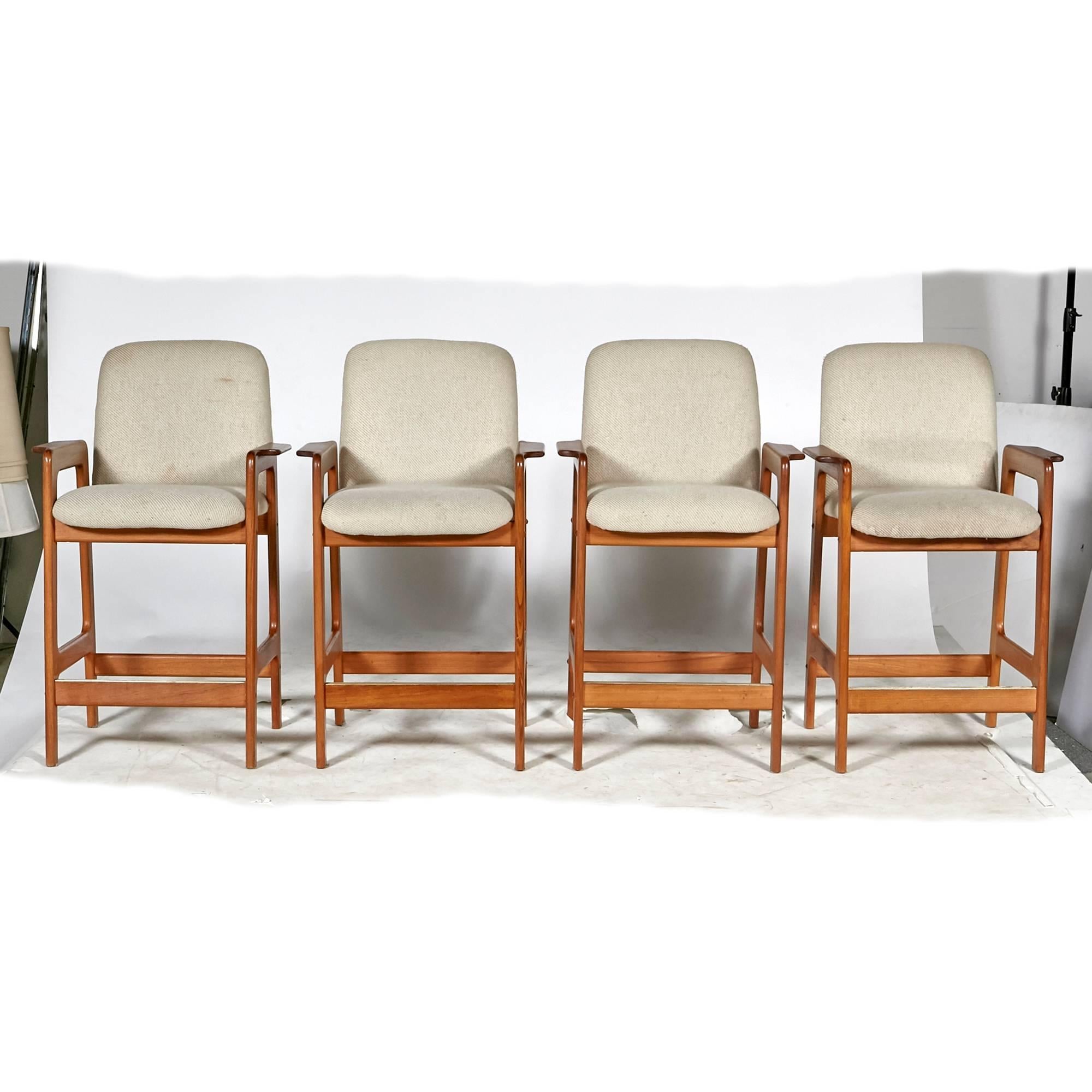 Vintage mid-20th century Benny Linden teak set of four bar stools with original cloth upholstery. Danish design manufactured in Thailand by Sun Wood. Seat height: 28in. Fabric is original and may need to be replaced.
 