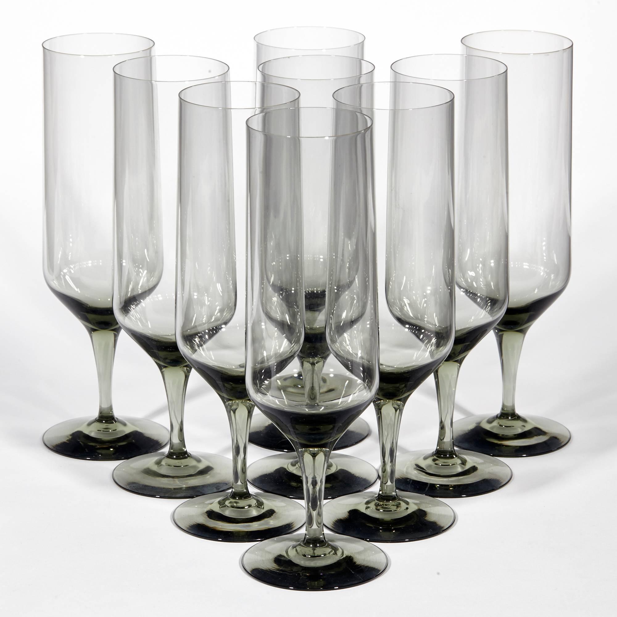 Vintage Holmegaard Per Lütken Denmark set of nine smoked glass champagne flutes, circa 1950s.