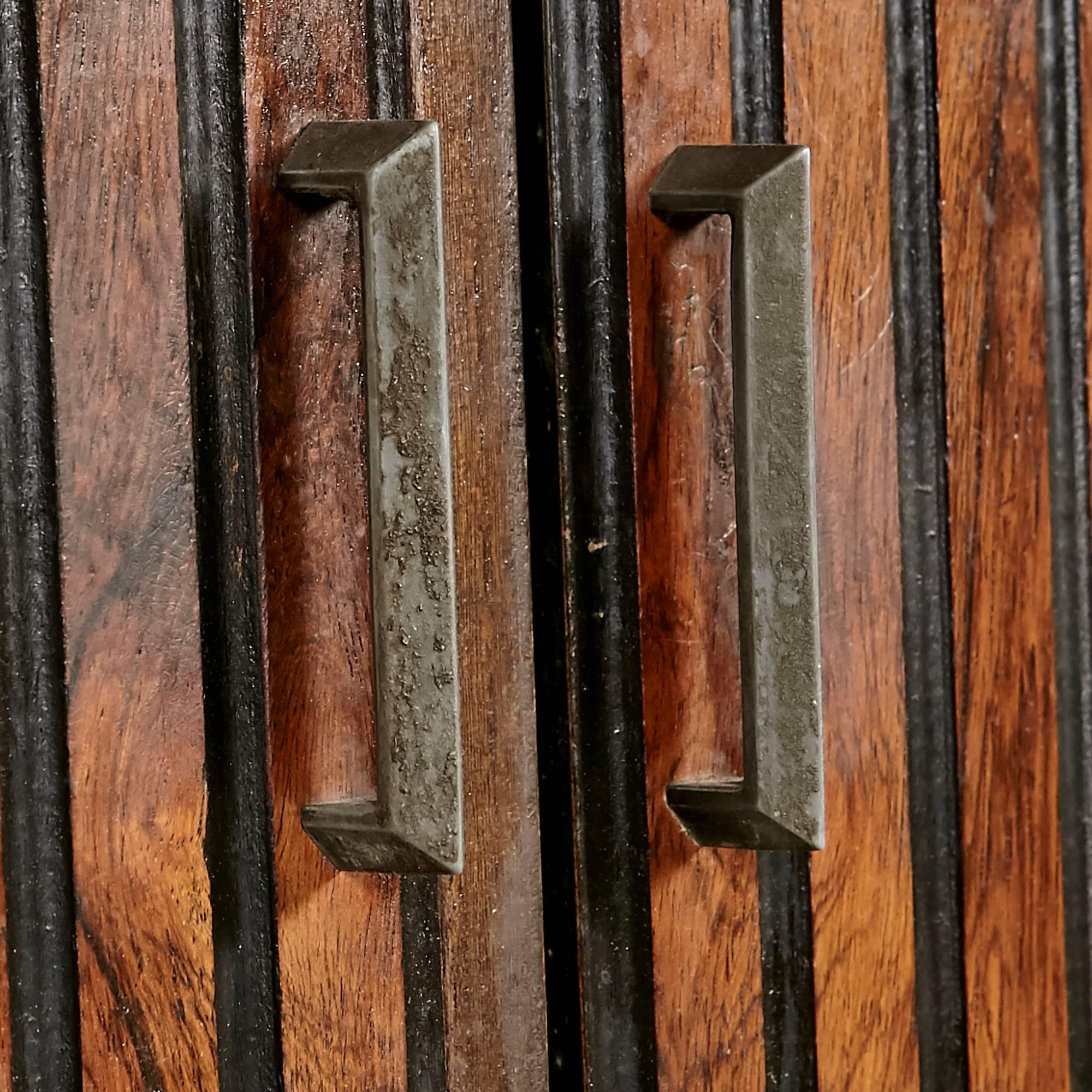 1960s walnut wood tall armoire-style dresser by Bassett Furniture Co. The dresser has four drawers for storage. The dresser also has open storage space and brass pulls. Newly refinished. Marked.