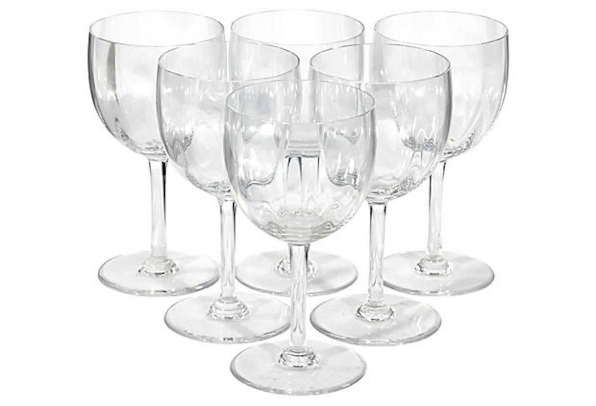 Set of six Montaigne delicate optic glass wine stems. Marked: Baccarat, France.
 