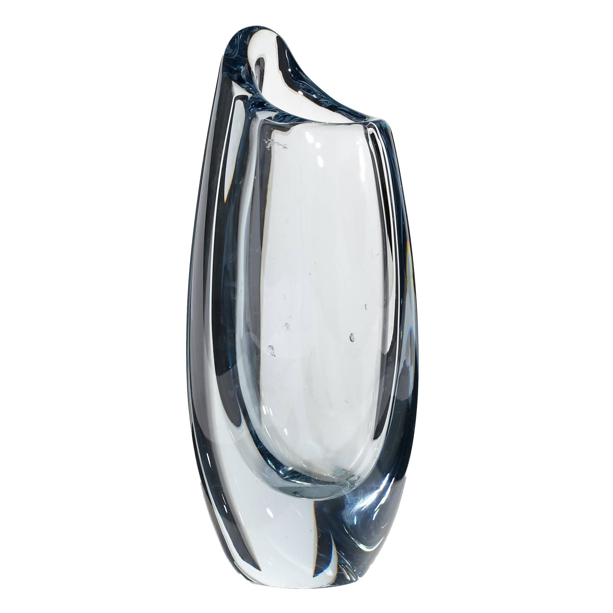 Flattened and slightly bulbous cylindrical glass form vase with asymmetrical rim for Strombergshyttan Sweden designed by Gunnar Nylund, circa 1950s. Marked.