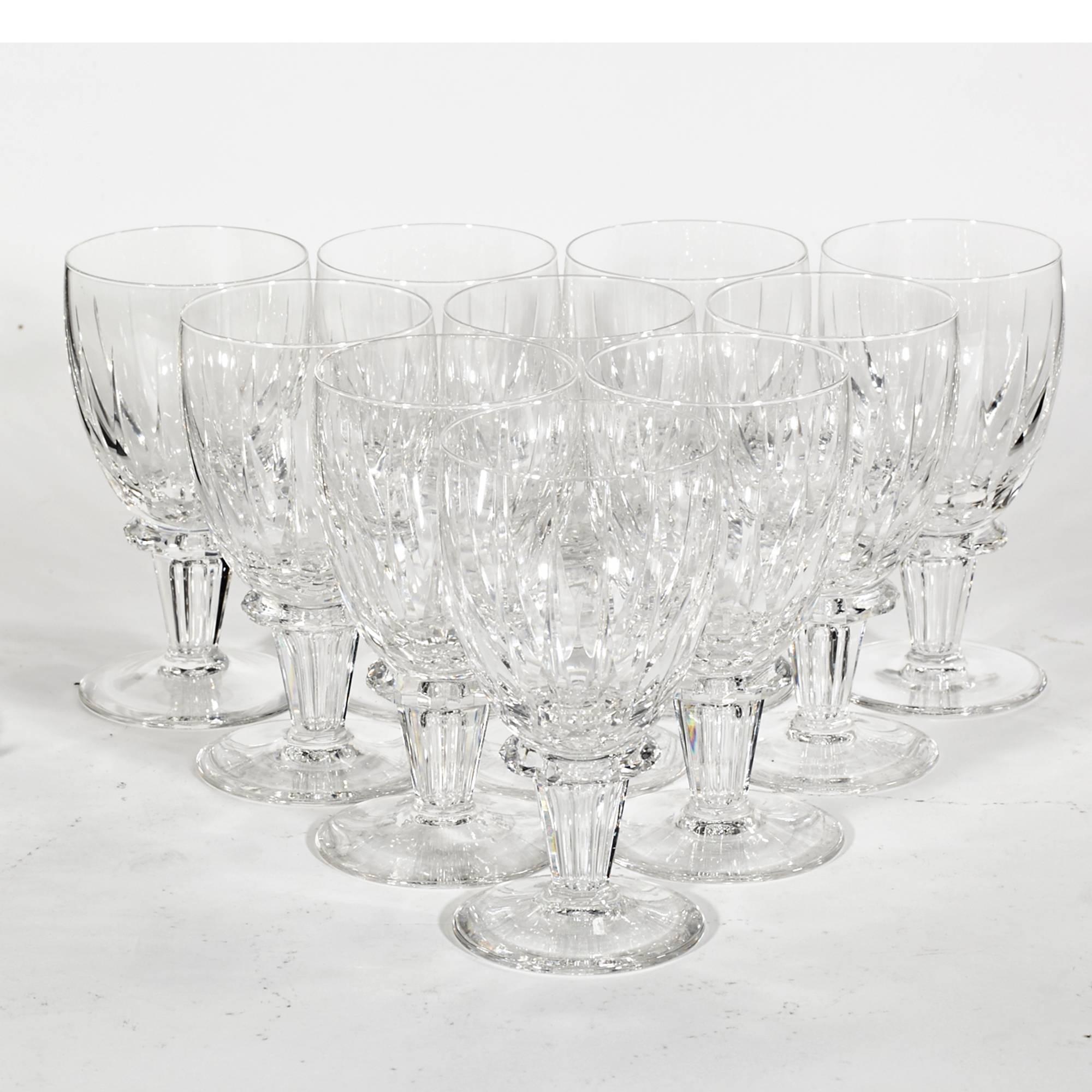 Vintage Dutch royal Leerdam glass goblets in the Rondo pattern, set of ten. The Rondo pattern has been out of production since 1980. It features deep vertical cuts on the bowl, with a unique notched wafer stem. One stem has a small rim nick.