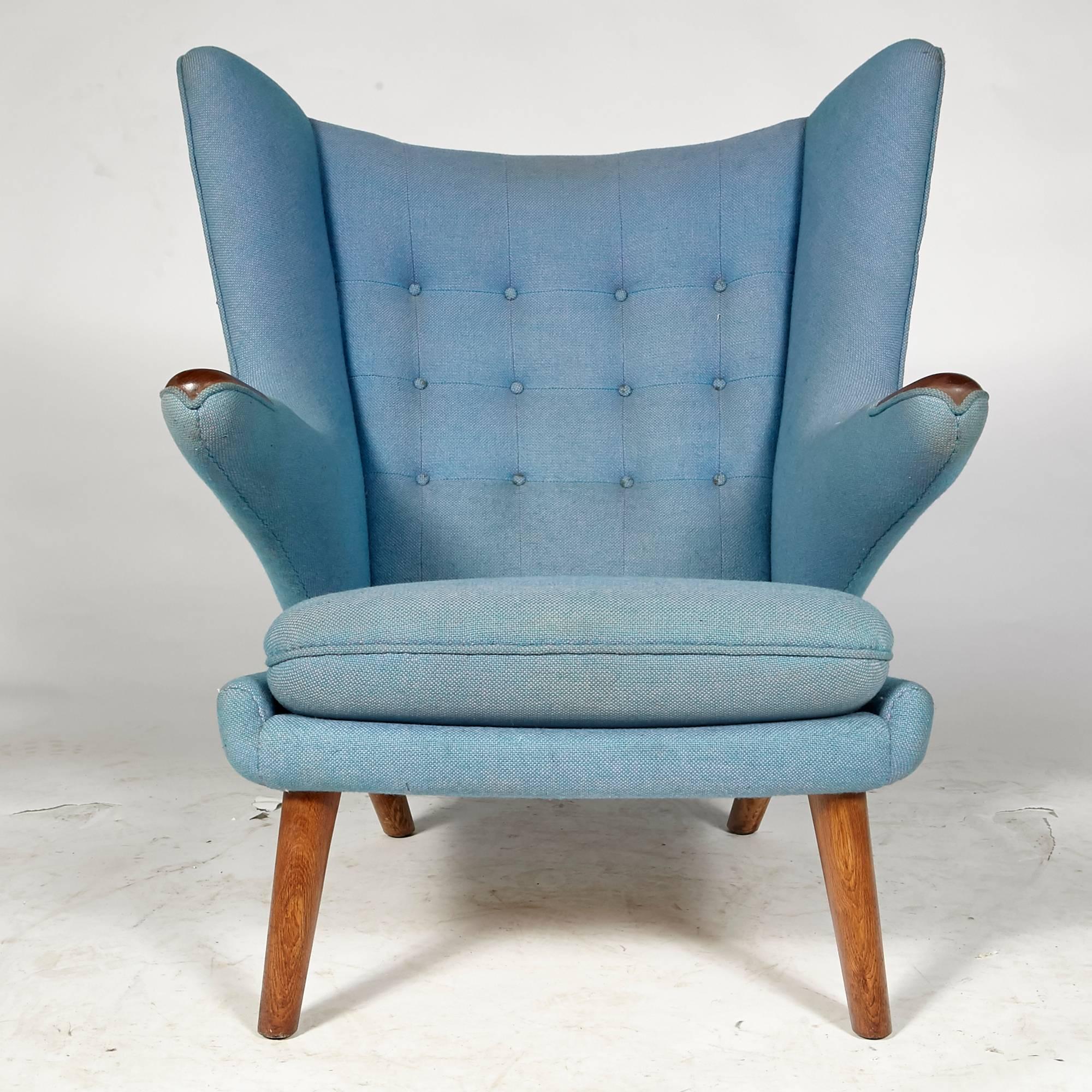 Vintage Danish papa bear chair designed by Hans J Wegner for AP Stolen. This is model AP19 in original turquoise fabric marked 1956 underneath. Measure: Arm height 24.5in.