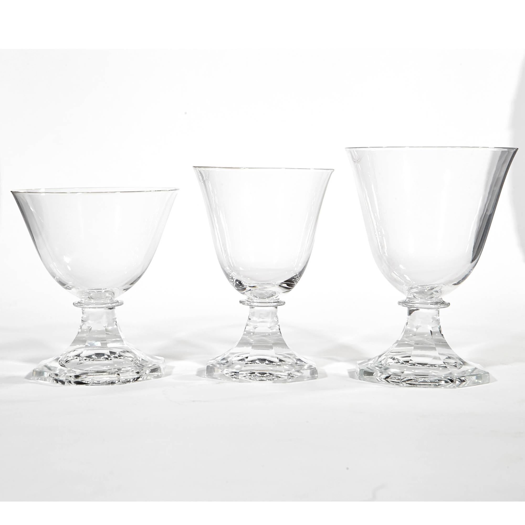 Set of 45 Swedish hand-cut crystal stems in the Seaford pattern by Orrefors, circa 1950.
Measures: Eight wines 3.5in.D x 5in.H
Ten low coupes 3.5in.D x 4in.H
Seven small wines 3in.D x 4.5in.H
Six liquor coupes 2.75in.D x 3.25in.H
Six small