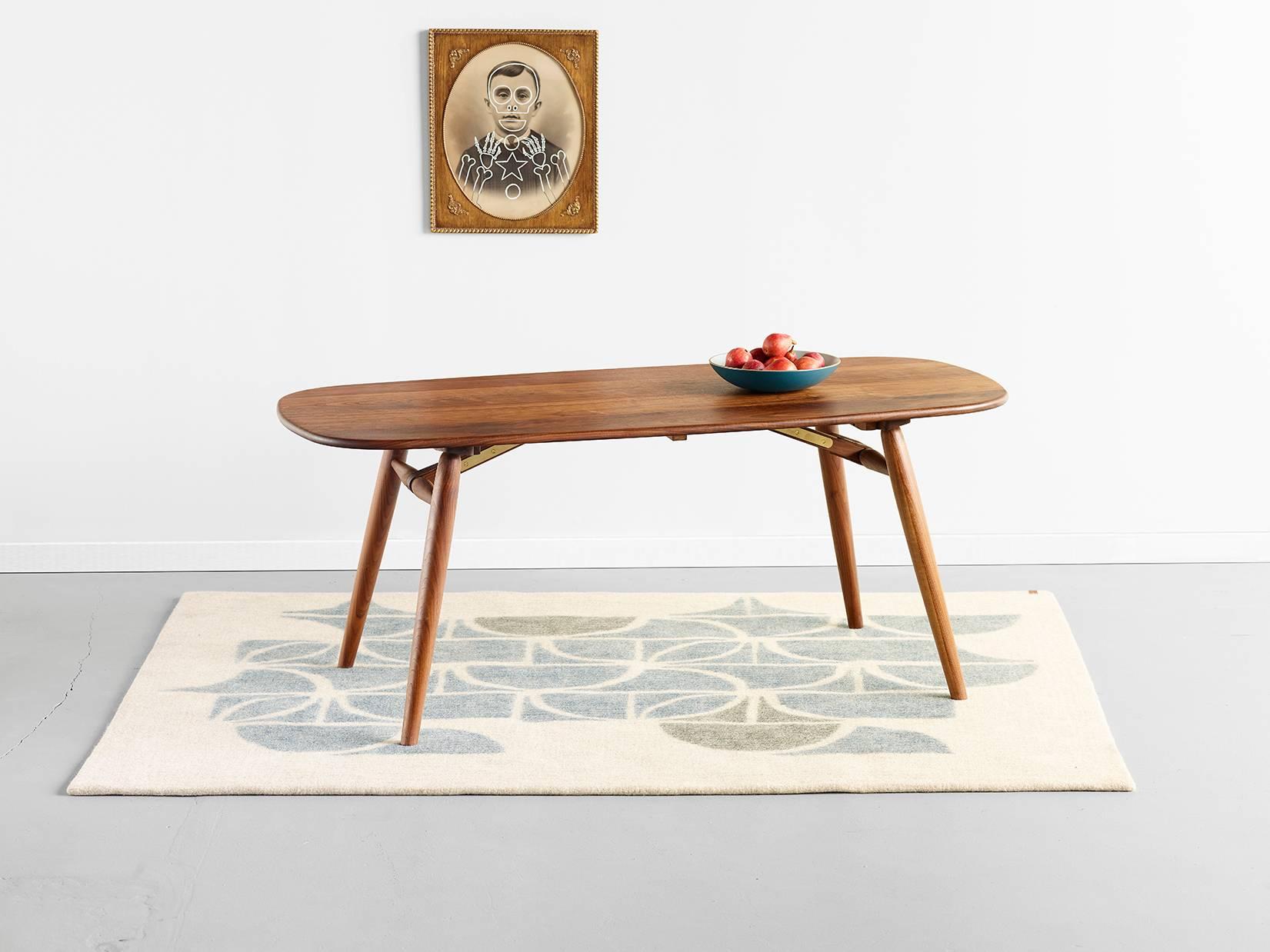 This large natural walnut dining table from the Nomad Collection from Jacob May, exclusively at Heath Ceramics, is also available in two other finishes, oxidized oak and natural oak. 

The table proves that great design can be both clever and