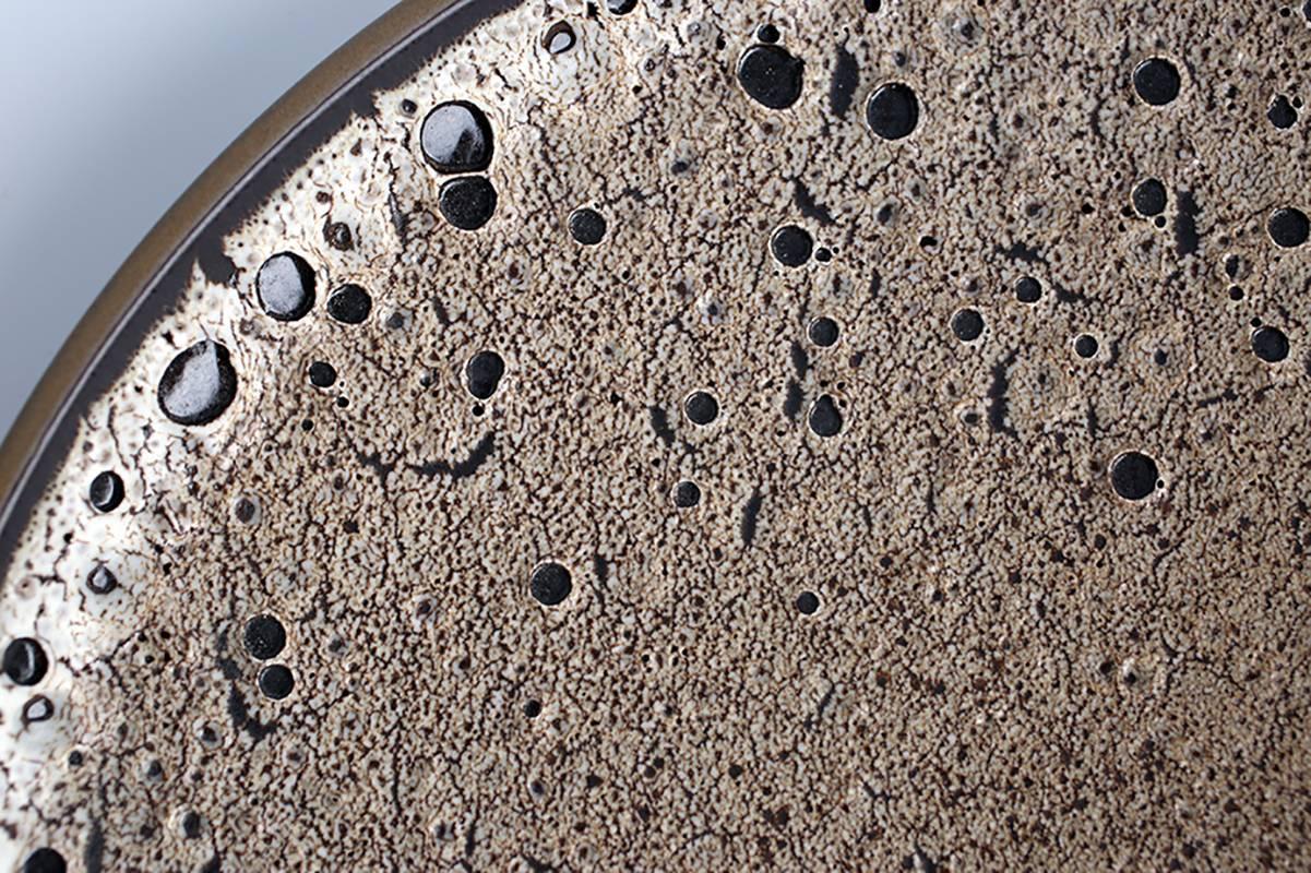This Platter featured an almost lunar surface texture, with one of-a-kind hand done glaze, the latest from Tung Chiang and the Heath Clay Studio Design Series 4: Alchemy.

Now in its fourth year, the Heath Design Series showcases the year-long