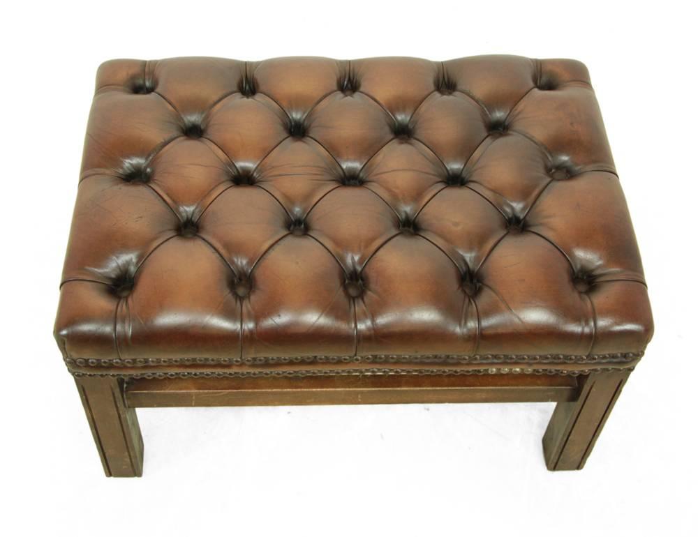 Buttoned leather footstool, circa 1960
A good quality, mahogany framed buttoned leather footstool in good vintage condition, no rips or repairs to the leather, light marks to legs
 
Age: 1960.
Style: Traditional.
Material: Mahogany