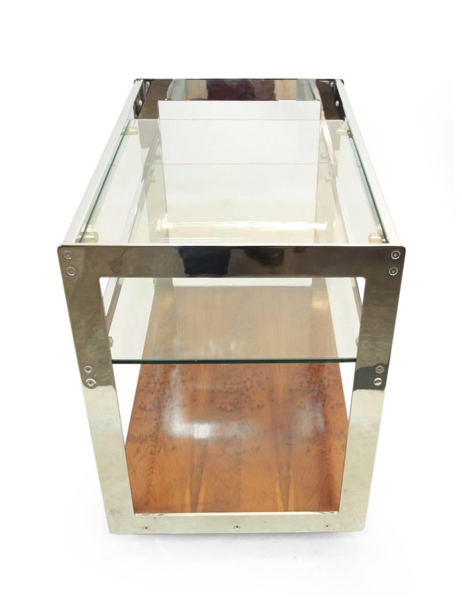 Chrome and glass drinks trolley by Merrow Associates
a two-tier glass shelf drinks trolley by Merrow Associates, with yew base chromed steel supports and glass shelves, small area of chrome has come off please see photo.
Age: 1970.
Style:
