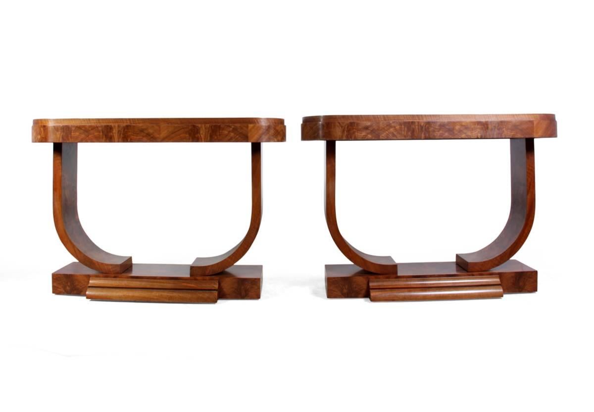 Pair of Fine Art Deco console tables by Guerin, Paris, circa 1920.

A fine quality pair of walnut console table’s produced by Georges and Gaston Guerin in Paris in the 1920s, standing on u bases these console tables has been fully restored and are
