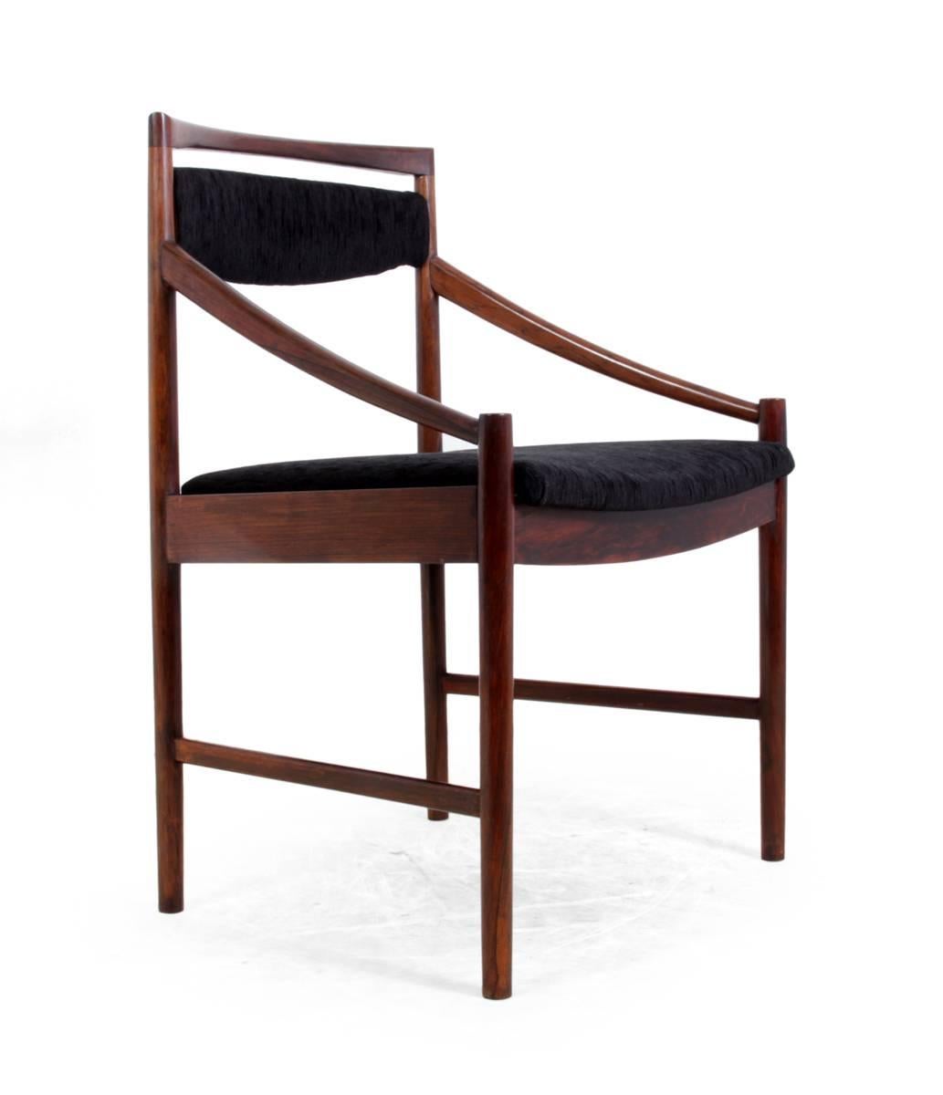 Set of six rosewood dining chairs by McIntosh, circa 1950.
 
Set of six, Mid-Century Modern, solid rosewood, English, dining chairs by McIntosh made in the 1950s. The frames are solid with no loose joints or breaks and these chairs have been fully