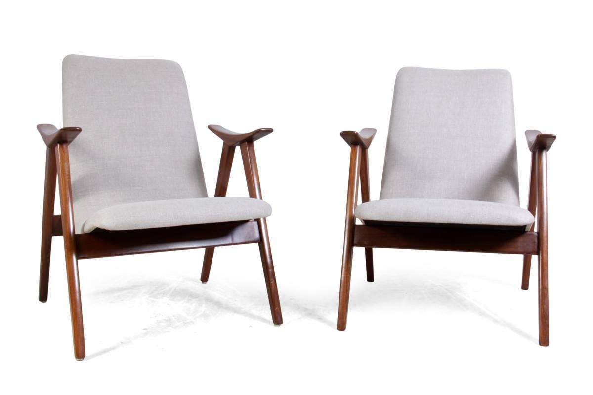 Mid-Century armchairs, teak circa 1960.

A pair of Scandinavian Mid-Century armchairs possibly Swedish, were produced circa 1960s having a solid teak frame and curved newly upholstered back and seat. These chairs are in excellent condition.
Age: