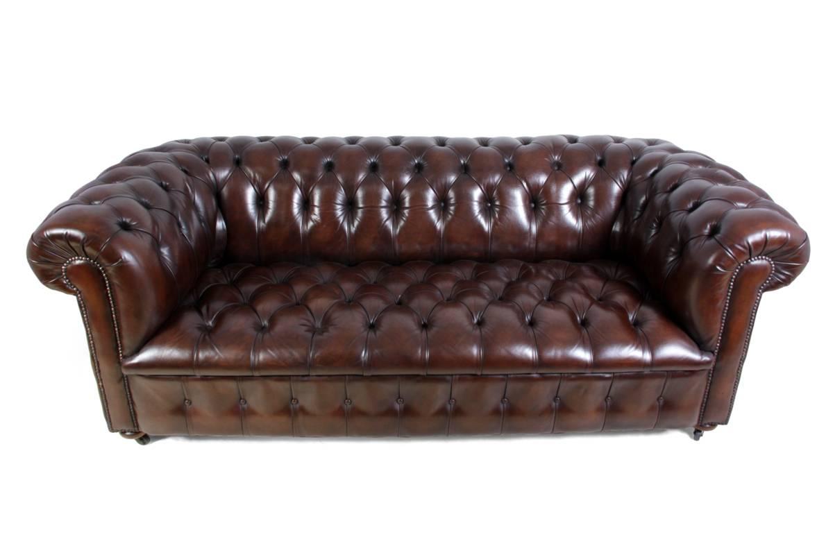 Vintage leather chesterfield.

A thick hide vintage brown leather chesterfield with deep buttoned back and seat, coil sprung with a solid hardwood frame in very good condition having minimal wear and no damage to the leather.
Age: circa