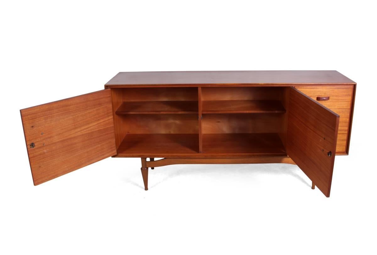 Mid-Century sideboard in rosewood.
Produced in Italy in the 1950s using Indian rosewood and mahogany this sideboard has two cupboards and three drawers, this sideboard is in very good condition throughout
Age: circa 1950.
Style: Mid-Century