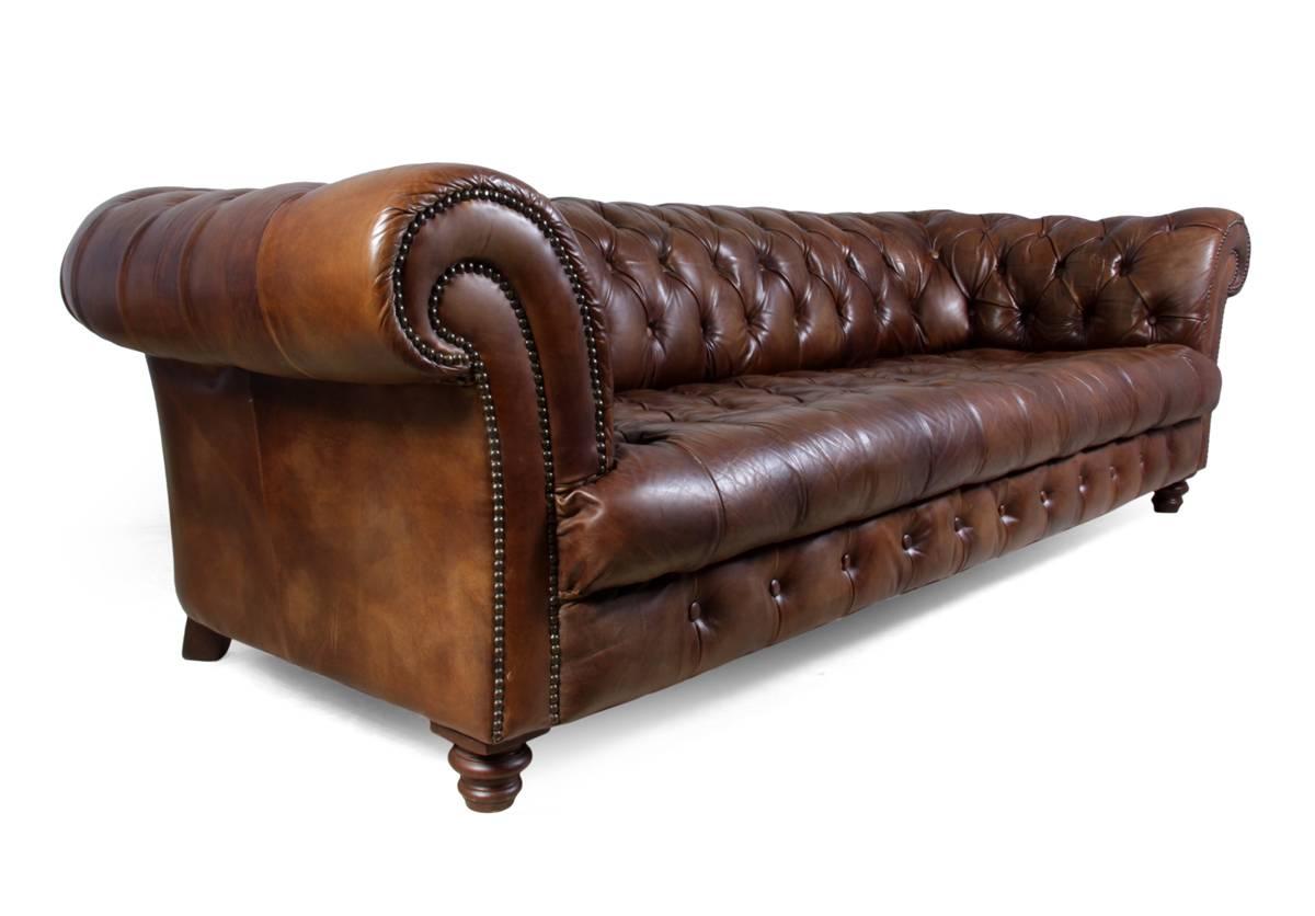 This thick hide leather Chesterfield is in excellent condition having a solid hardwood frame and coil sprung seat and back that is deep buttoned, this sofa will comfortably seat four people and has a very deep seat. 
This Chesterfield has no rips