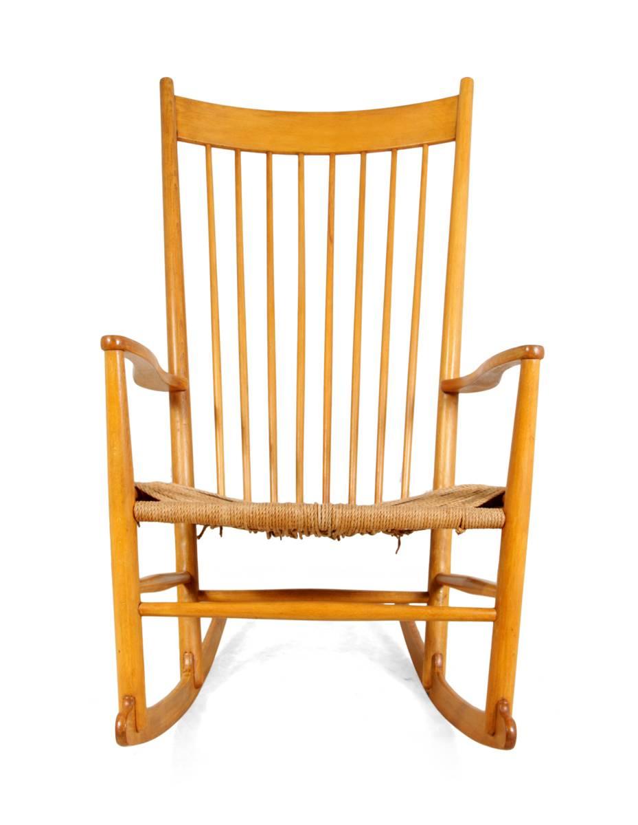 Beech rocking chair J16 by Hans Wegner
This original Classic J16 chair by Hans Wegner was designed in 1944, this version is in solid beech in original vintage condition, the weave on the seat has become slightly loose and there are a few age