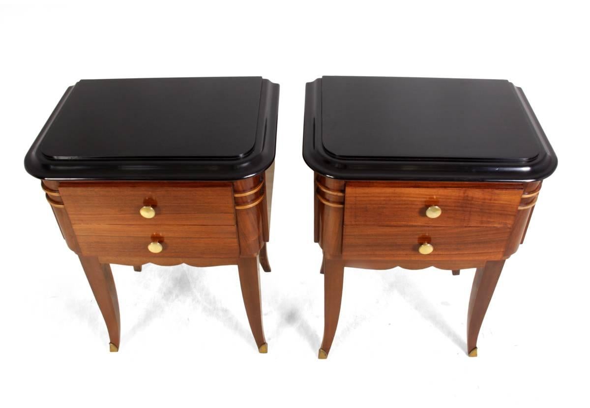 A pair of Art Deco bedside tables, circa 1920
A pair of French Art Deco bedside tables in rosewood produced in the 1920s, with two drawers, ebonised tops brass handles and feet tips, all been fully restored and hand polished they are in excellent