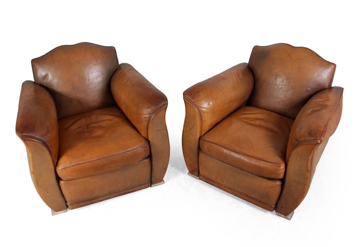 Pair of French leather club chairs
A pair of thick hide leather club chairs in Art Deco style produced, circa 1960s and sit on aluminium feet, the chairs are fully sprung (seat back and arms) with a solid hardwood frame and are in excellent