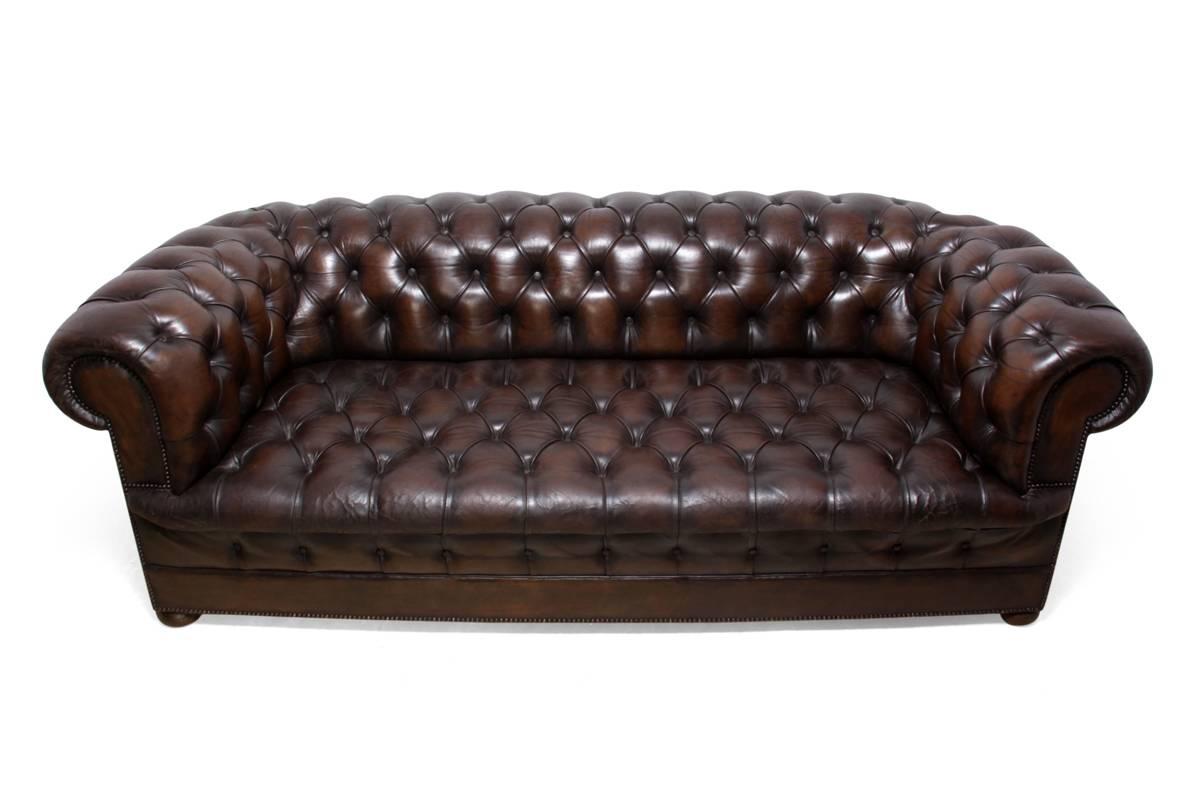 Vintage brown leather Chesterfield
British produced Chesterfield from the 1960s has a solid hardwood frame, coil sprung seat arms and back and has been upholstered using thick hide leather. With a deep buttoned back and seat, the chesterfield is in