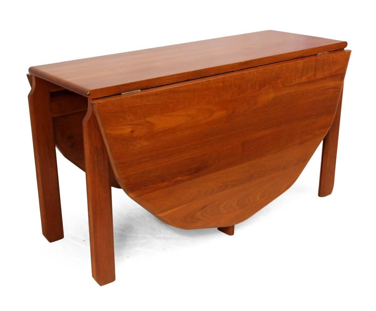Solid teak dining table, Dutch, circa 1960

This solid teak drop leaf dining table has rosewood inlay edging, six legs with shaped tops and is in excellent condition throughout this will seat six to eight people

Age: 1960
Style: Mid-Century