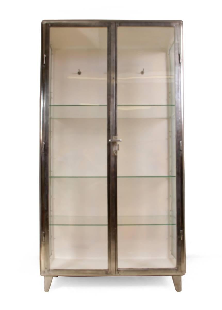 Polished steel medical cabinet, circa 1930
This highly polished steel 1930s medical cabinet has two doors and three adjustable glass shelves, it has had the steel frame highly polished using a seven stage process, the interior back of the cabinet