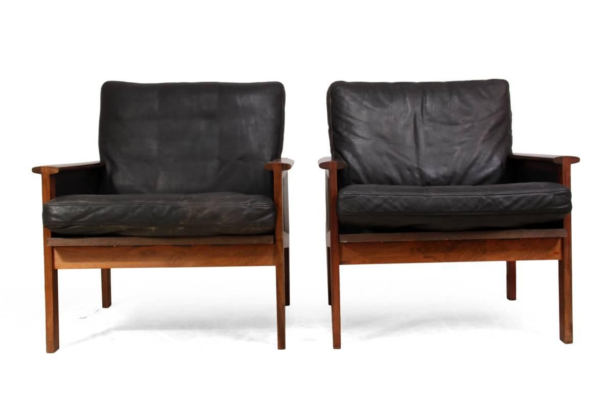Pair of Capella armchairs by Illum Wikkelso for Eilersen

This pair of rosewood framed leather upholstery armchairs were designed by Illum Wikkeslow and produced by Eilersen in the 1960s, the frames have been sympathetically restored and had new