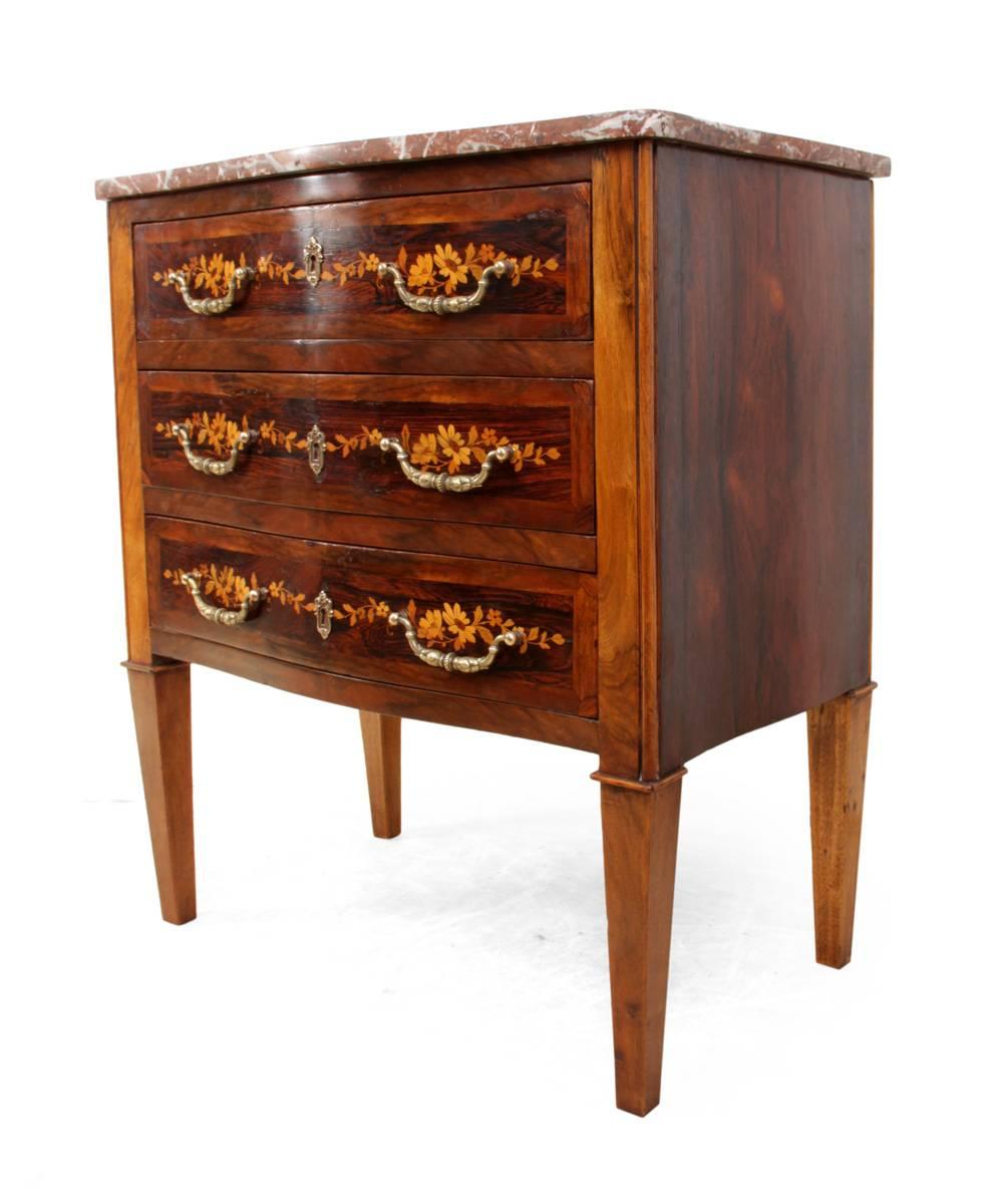 Antique Dutch Marquetry Commode, circa 1880.
This antique Dutch commode is produced in solid oak and walnut, with rosewood and walnut veneer and exotic veneer marquetry the rouge marble top is in good condition with no breaks or old repairs but