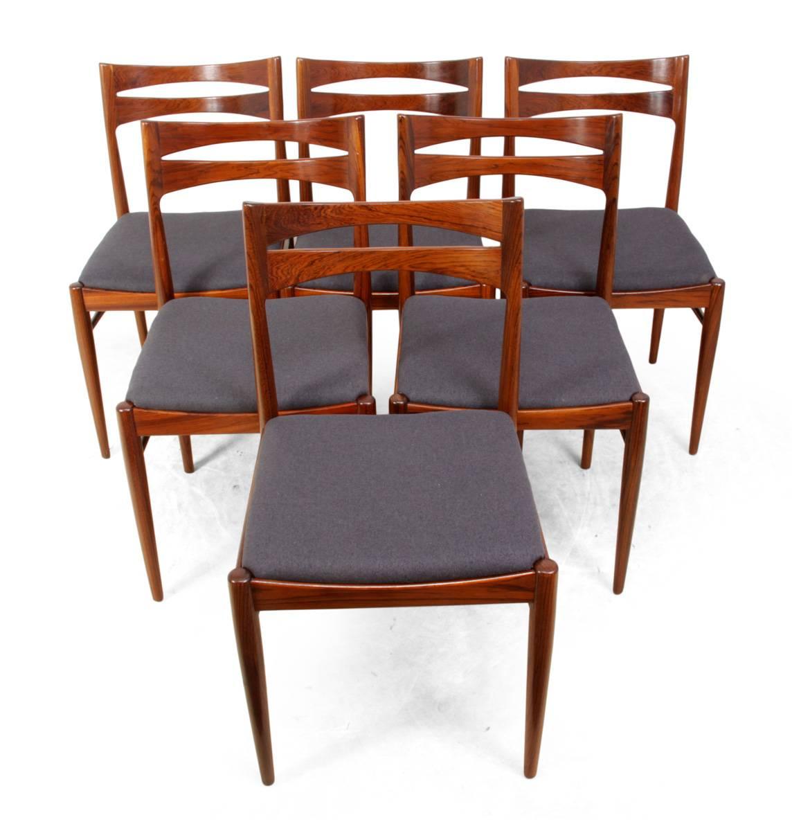 Midcentury Danish dining chairs set of six
This set of figured solid rosewood dining chairs have been fully polished and upholstered in grey 100% wool. All the joints are solid and have had no history of breaks, they were produced in Denmark in the