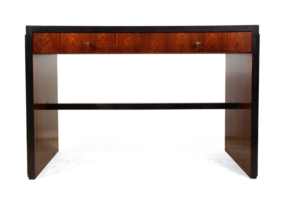 Art Deco desk in rosewood, French, 1920
This French produced high quality Art Deco desk is solid oak with rosewood veneer and ebony crossbanding solid ebony centre bar, silver plated locks and brass keys, the desk in very good condition having been