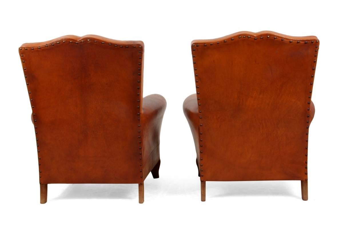 French Provincial Pair of Moustache Back French Leather Club Chairs