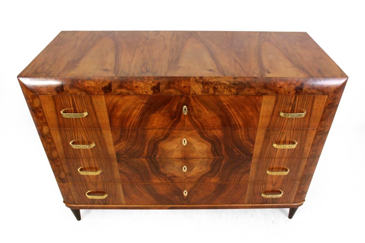 Art Deco commode in walnut, Italian, circa 1930
A four long drawer commode produced in Italy in the 1930s in very good condition dovetail joint construction, brass handles and escutcheon plates this chest has been professionally restored and hand