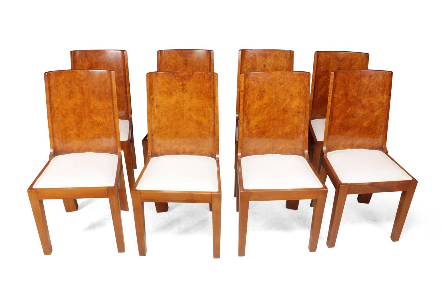 Art Deco dining chairs in walnut set of eight
A set of eight burr walnut curved back Art Deco dining chairs good heavy solid chairs in excellent fully restored with new leather upholstery these chairs have been professionally restored and hand