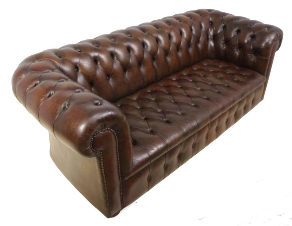 Pair of vintage brown leather Chesterfields
This pair of chesterfields are solid hardwood framed, fully buttoned with buttoned seats they are upholstered in thick hand dyed chestnut brown leather, they are both in very good condition with good
