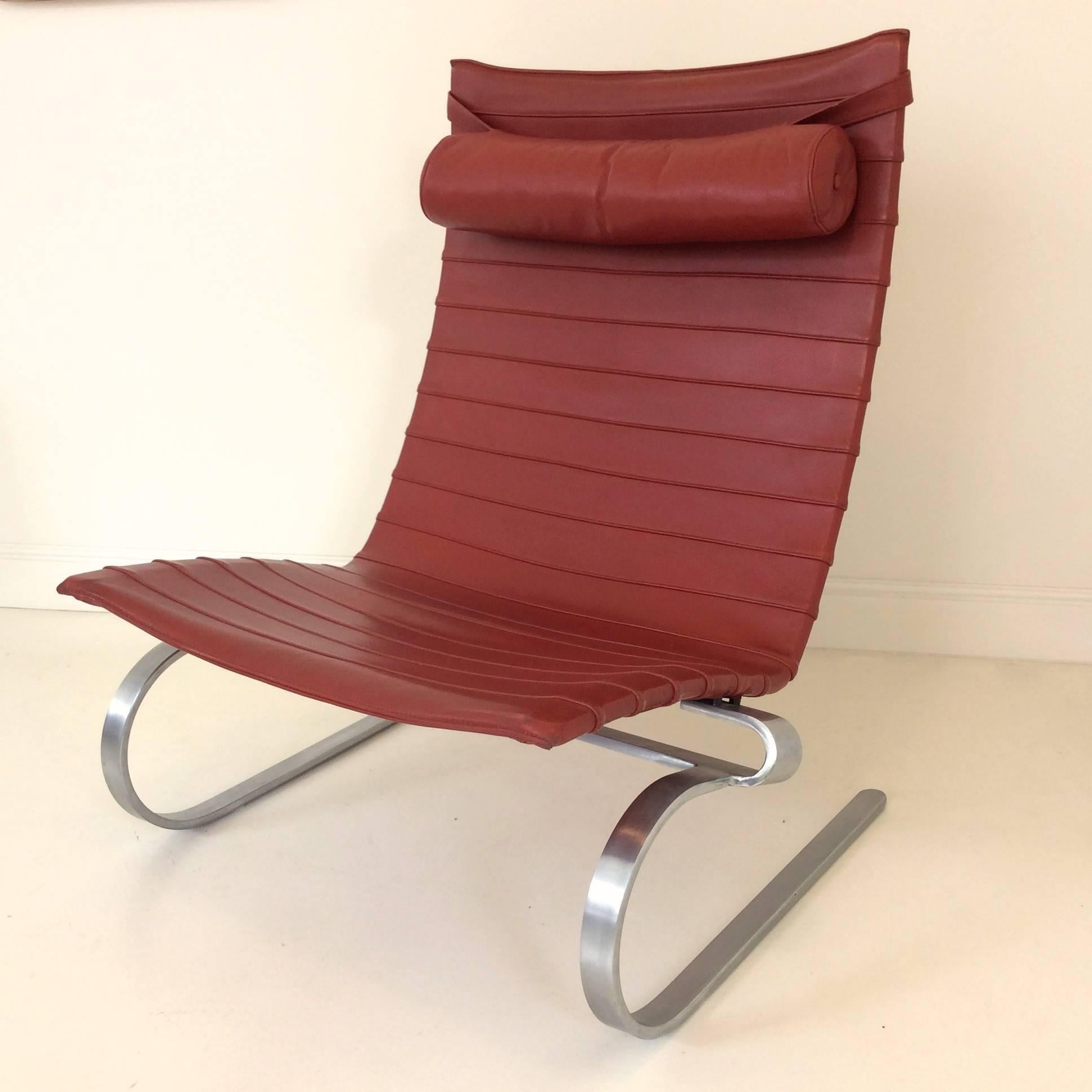 Nice PK-20 leather lounge chair designed in 1968 by Poul Kjærholm.
Fritz Hansen edition label underneath, circa 1980. 
Original cognac leather, Nickel-plated steel base. Head pillow.
Measures: H 81 cm, D 70 cm, W 80 cm, seat height 35 cm.
Good