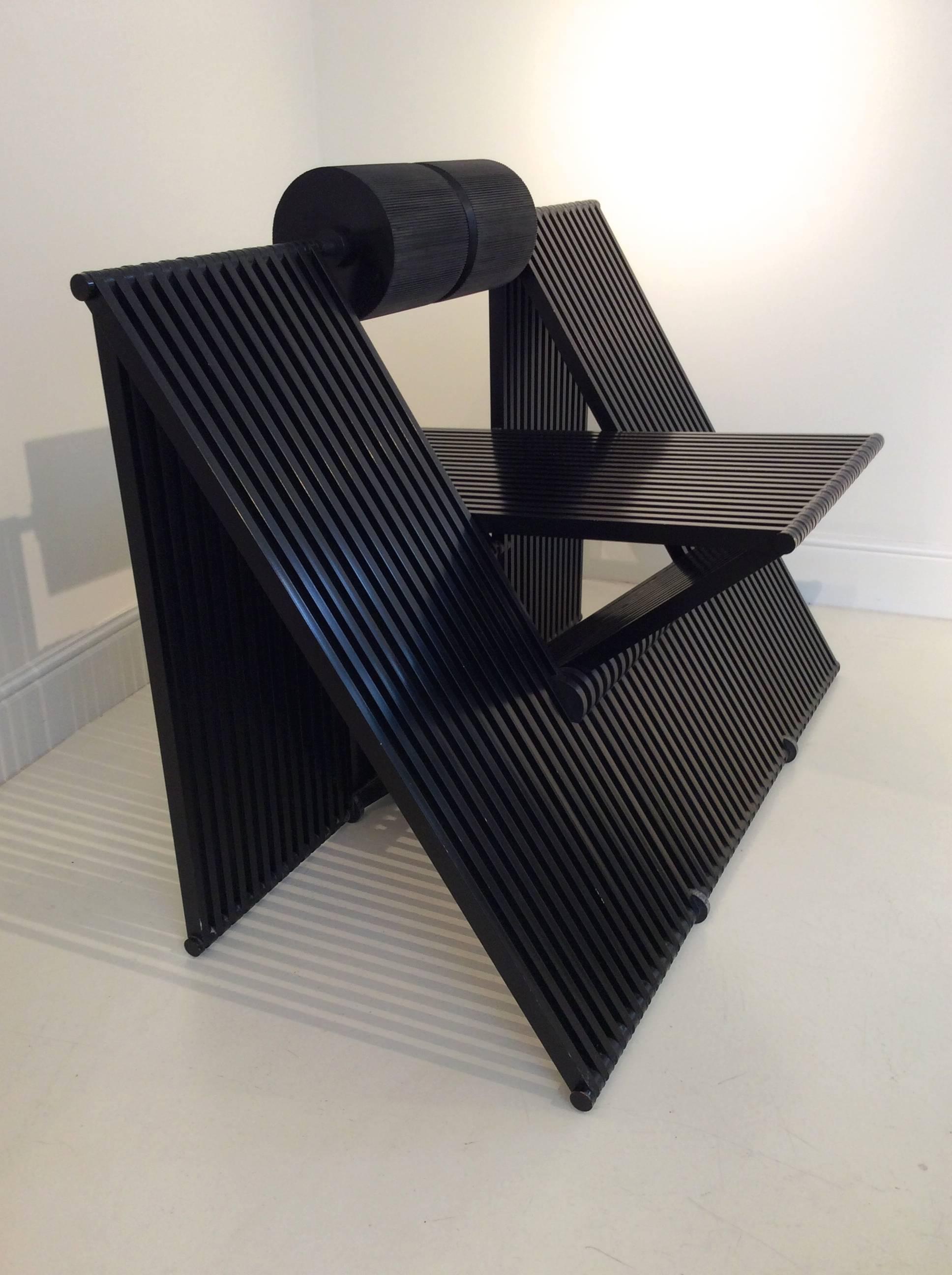 Sculptural Quarta chair by Mario Botta for Alias, 1984, Italy.
Black lacquered aluminium and back role from black polyurethane.
Measures: H: 67 cm, W: 98 cm, D: 65 cm.
Good condition.
Out of production.
We ship anywhere in the world, please feel