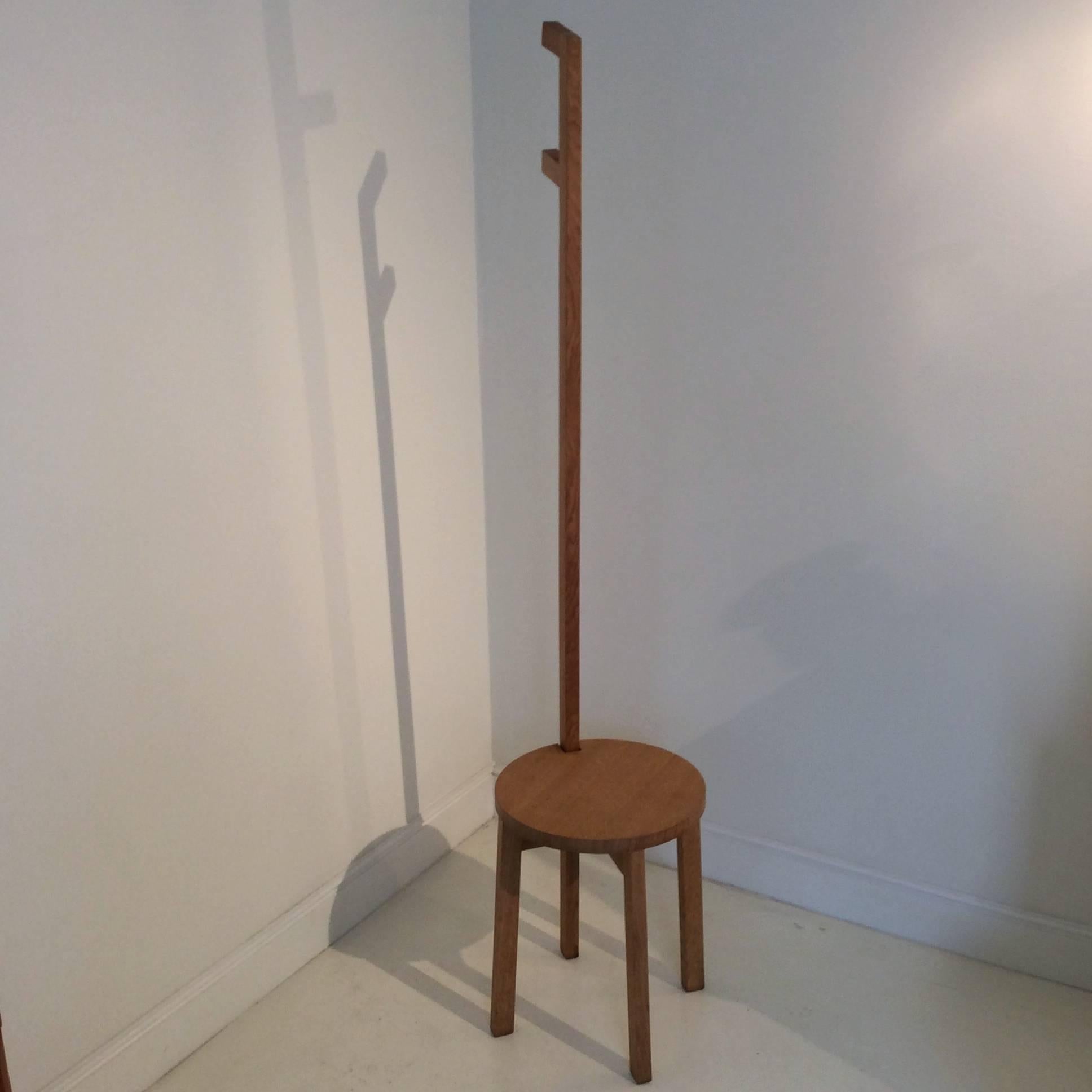 Marina Bautier, coat hanger-stool.
Prototype designed in 2007, for Idee in Japan.
Oak, round seat, four legs, one higher forming coat hanger.
Measures: H 160 cm, diameter 35 cm.
Exposed at the Tokyo Design Week in 2007.
In 2014 Marina Bautier award
