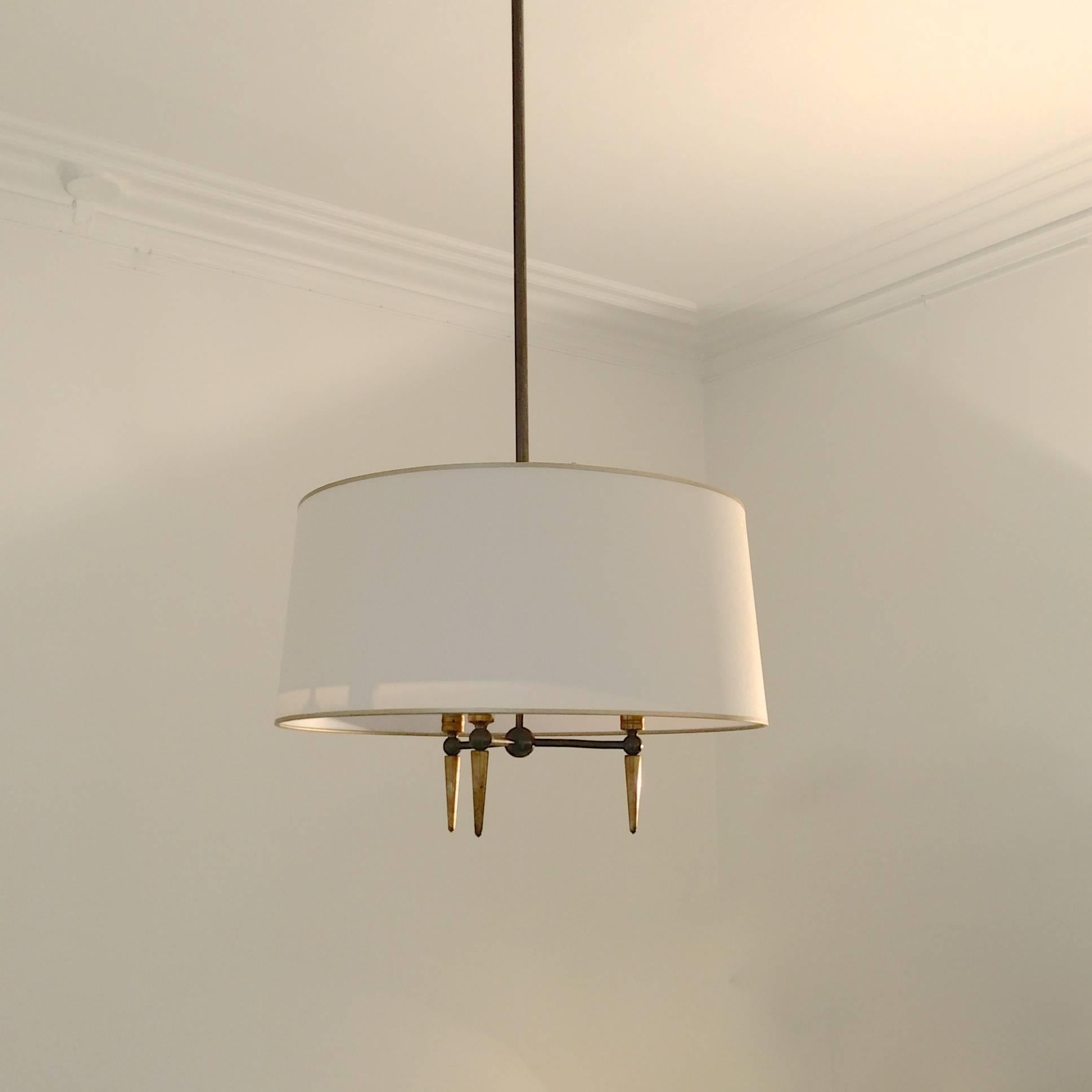Pendant light, circa 1950, France.
Opaline, fabric shade and patinated brass.
Three E22 bulbs of 40w.
Measures: Height 130 cm, diameter 44 cm.
High of the rod: 100 cm.
All purchases are covered by our Buyer Protection Guarantee.
This item can be