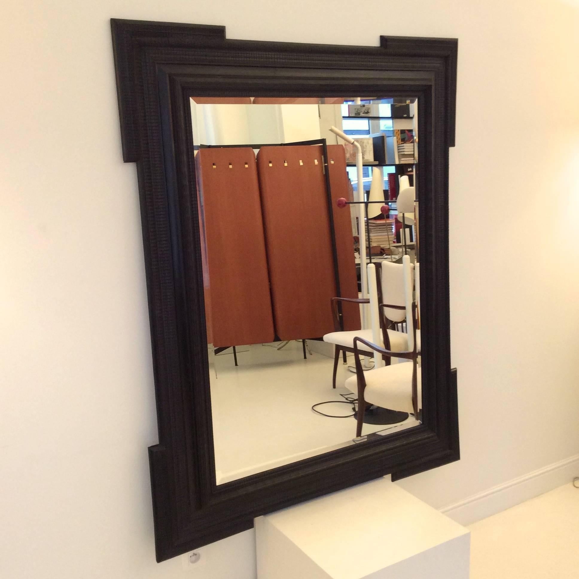Large black lacquered wood mirror,
circa 1930, Italy.
Wavy molding, new beveled mirror.
Measure: H 158 cm, W 125 cm, D 7 cm.
Good condition.