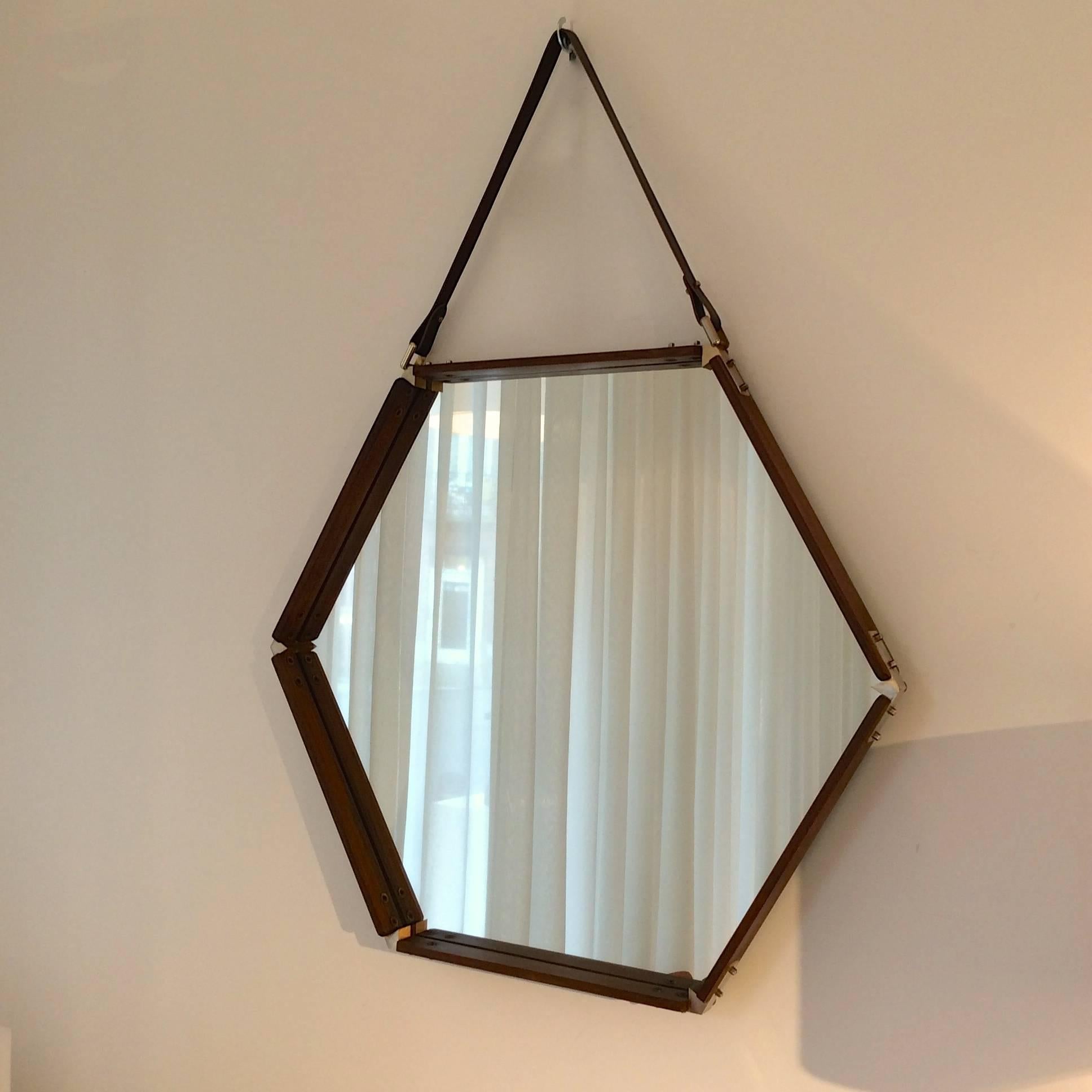 Nice hexagonal mirror, rosewood, brass and brown leather strap,
circa 1960, Italy.
Good condition.
Dimensions: 112 cm H, 84 cm W, 5 cm D.

 

